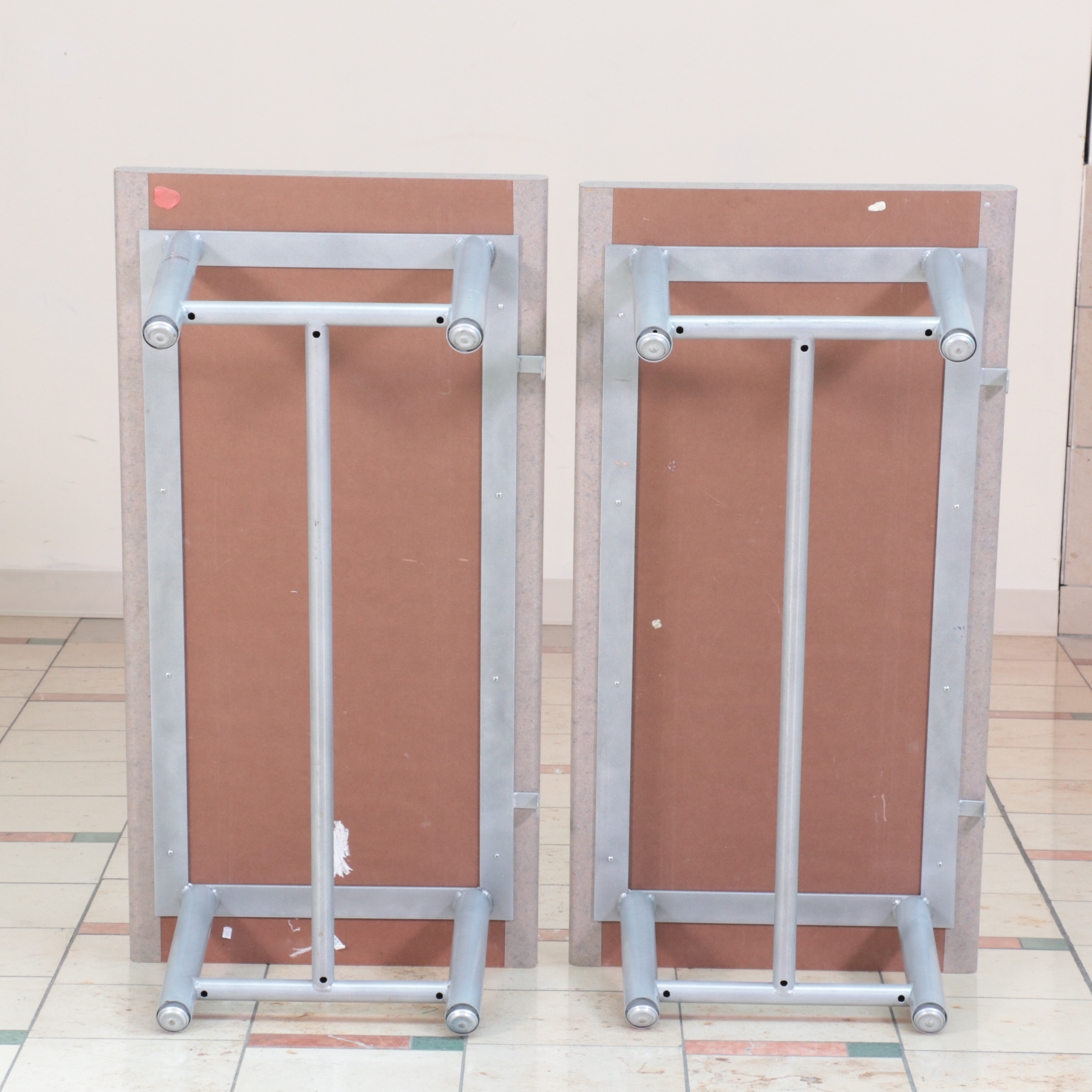 Pair of Laminate Top Metal Display Tables