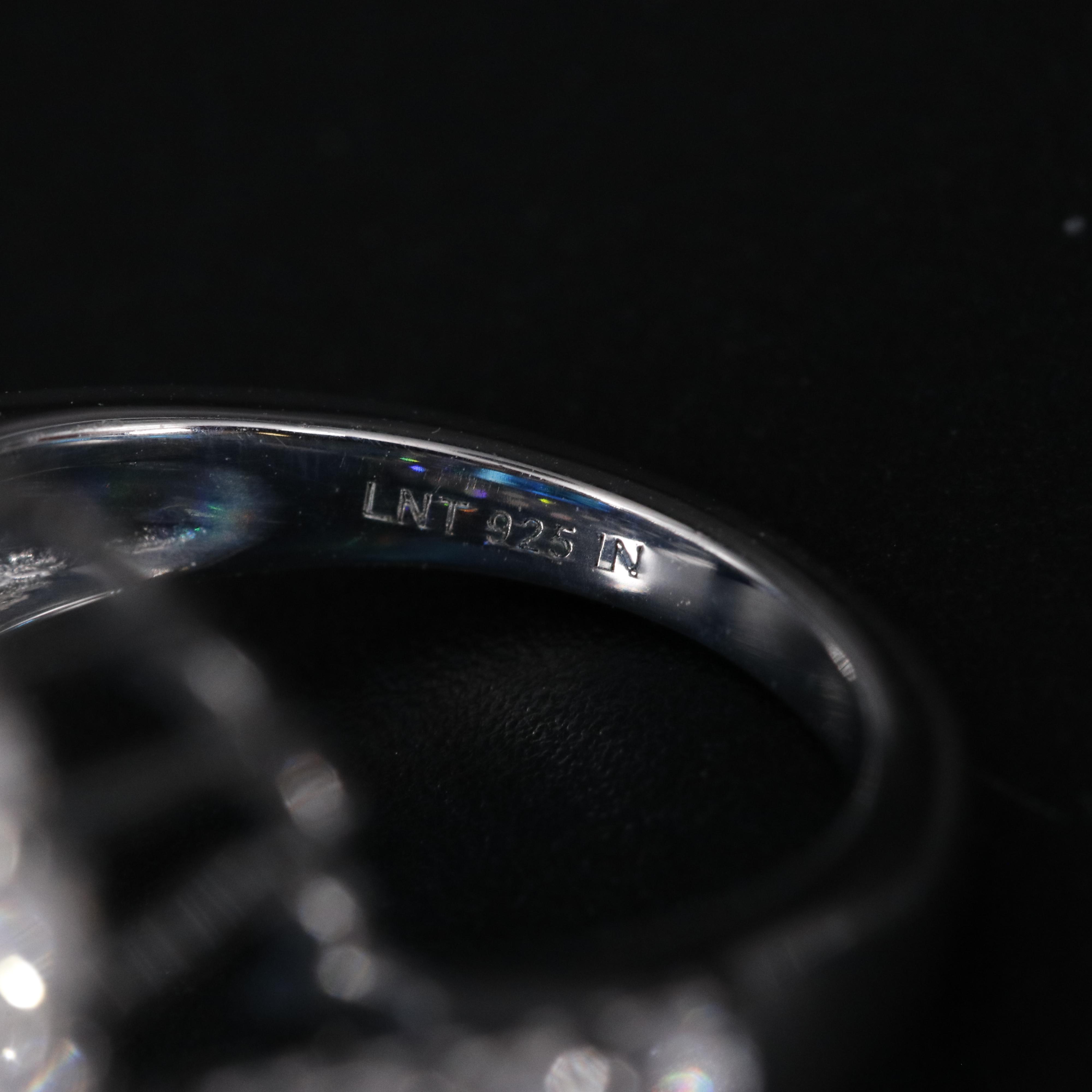 Sterling Silver Topaz and Cubic Zirconia Ring