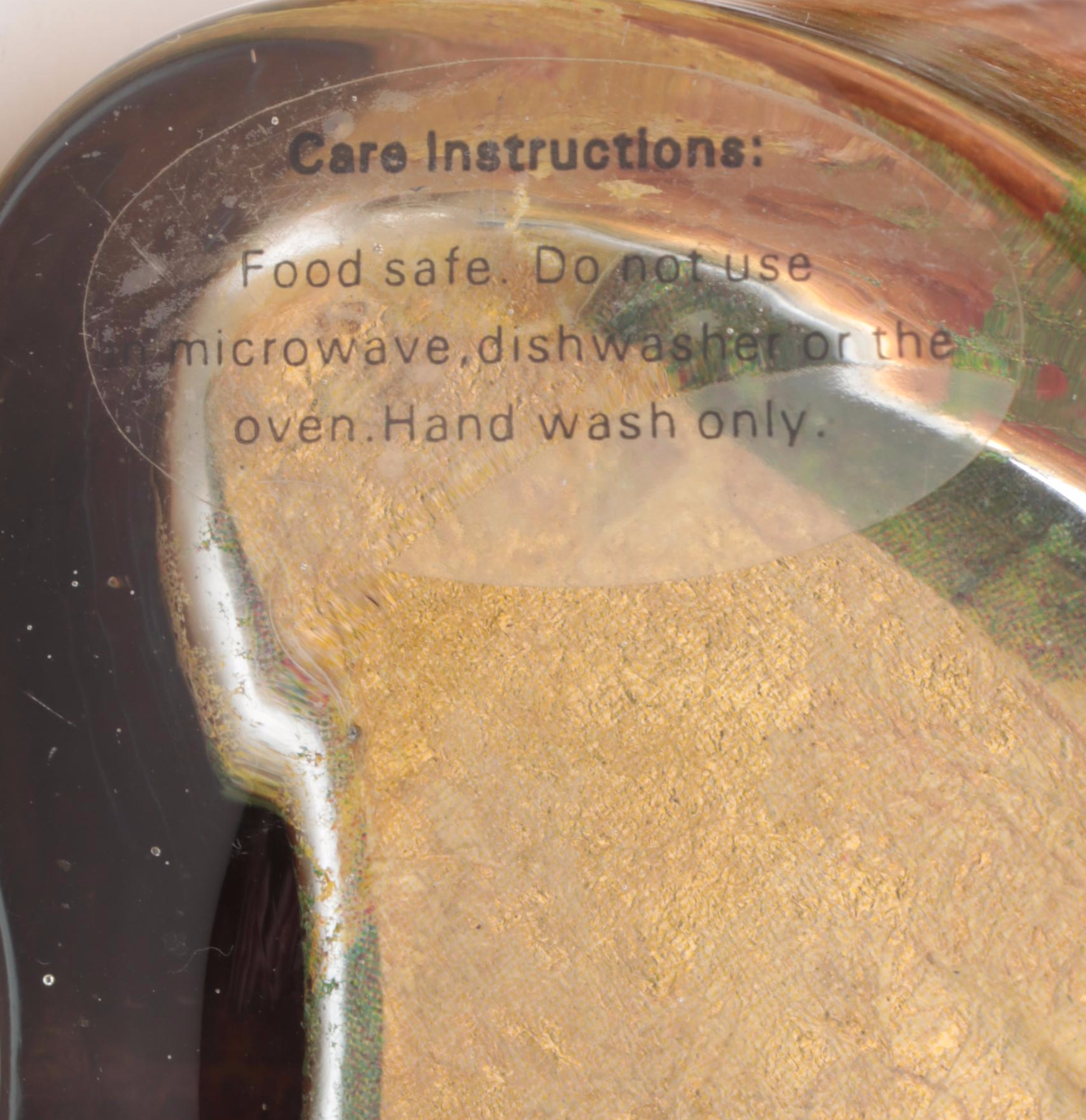 Orange Tinted Glass Vase with Potpourri and Other Glass Décor