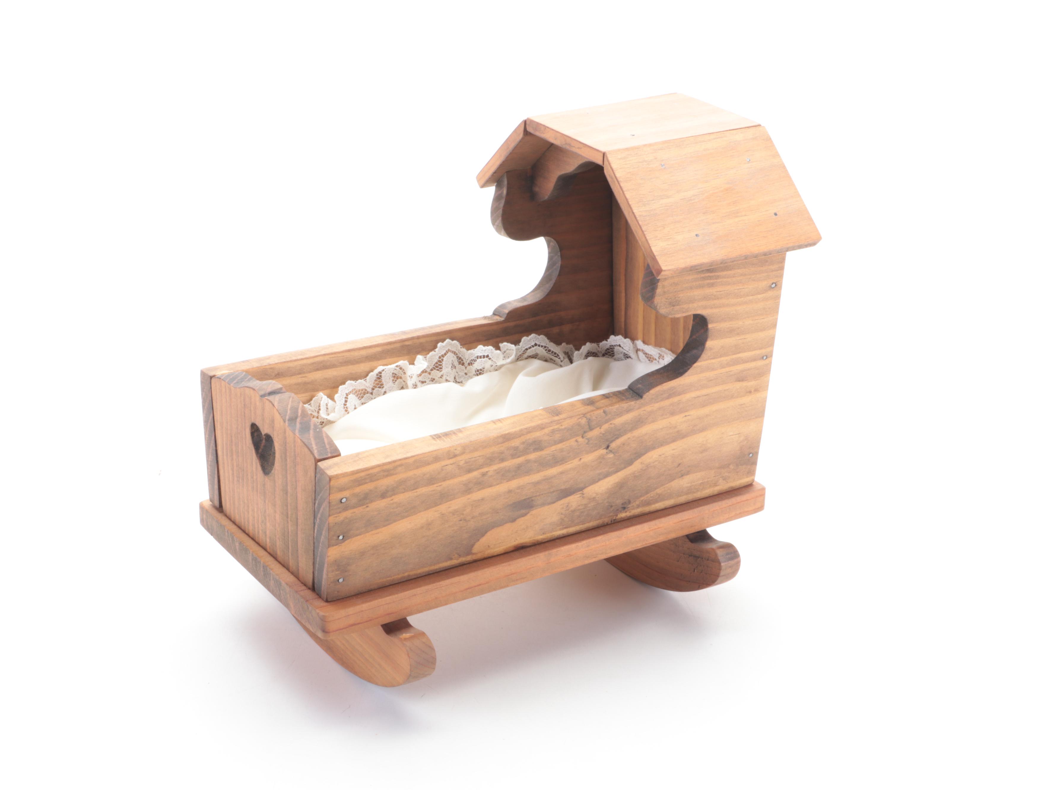 Limbach and Other Bisque Porcelain Dolls with Cradle