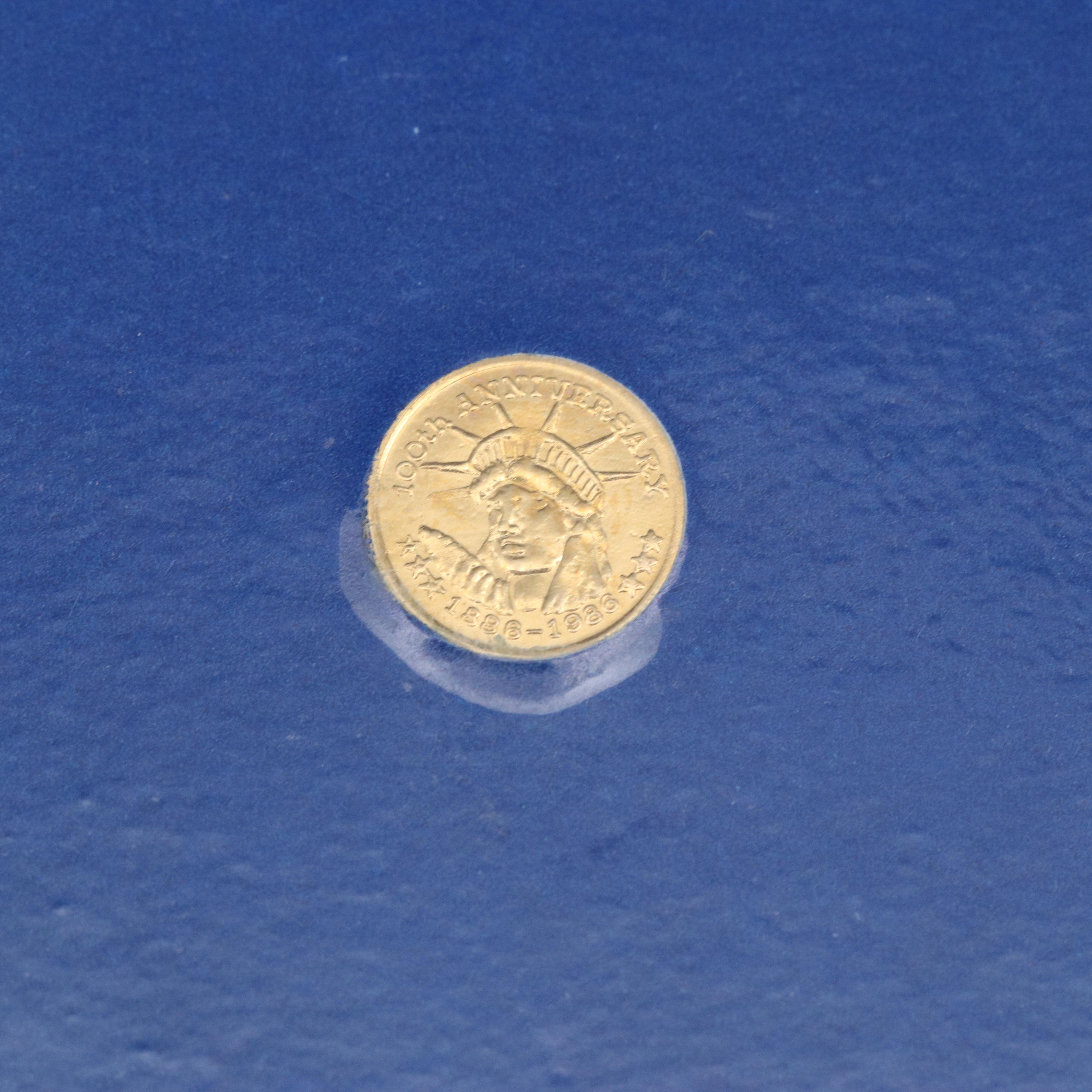 Nine Commemorative 100th Anniversary 14K Gold Statue of Liberty Miniature Coins