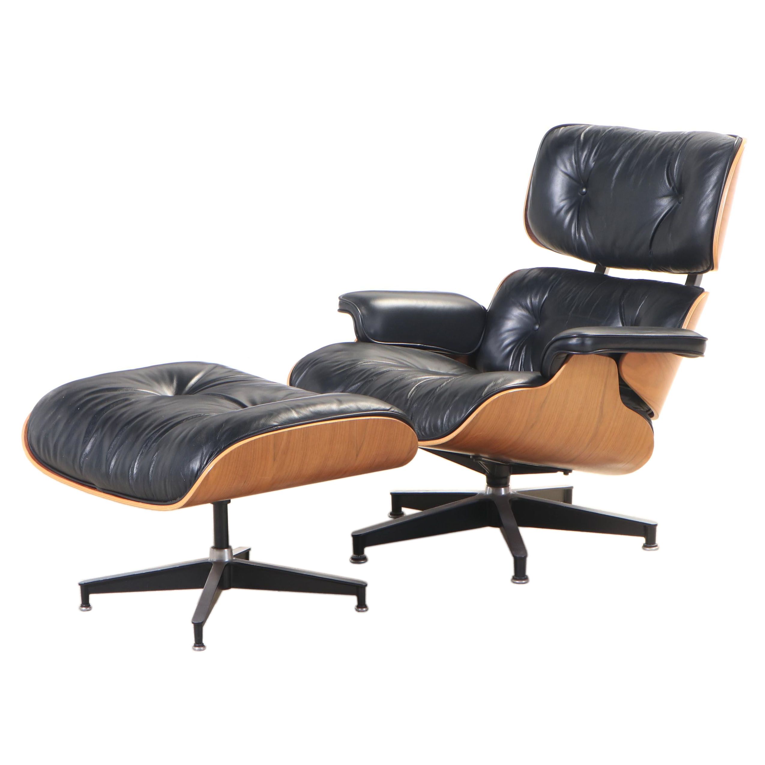 Eames for Herman Miller Laminated Walnut Lounge Chair and Ottoman, dated 2000