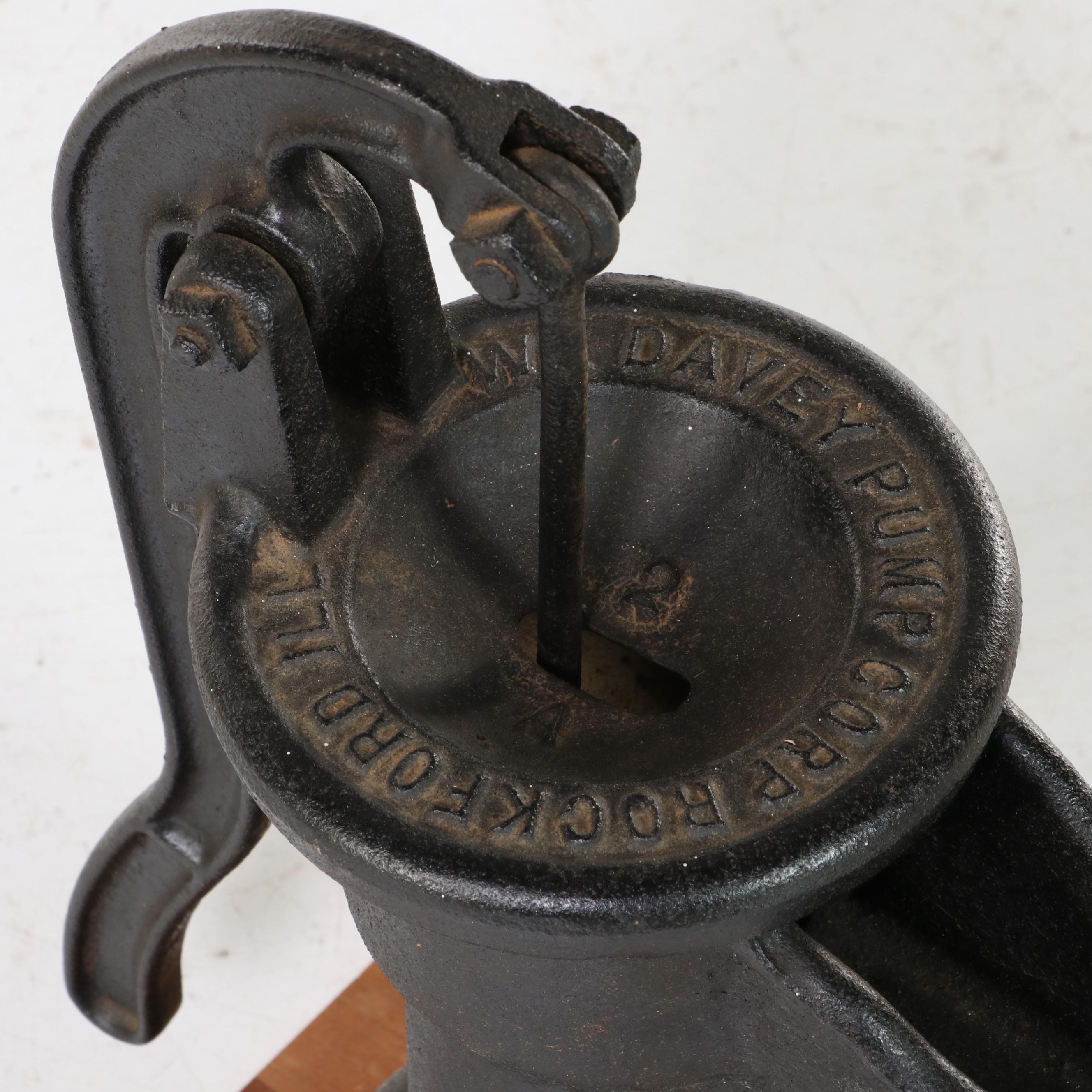 W.L. Davey Pump Corp. Cast Iron Water Hand Pump on Later Cherrywood Base