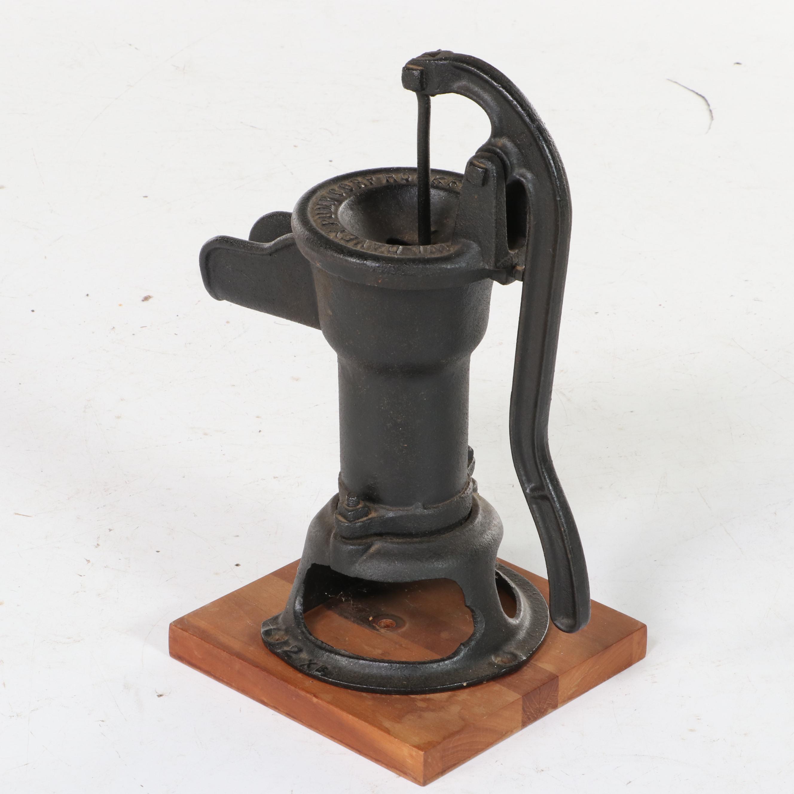 W.L. Davey Pump Corp. Cast Iron Water Hand Pump on Later Cherrywood Base