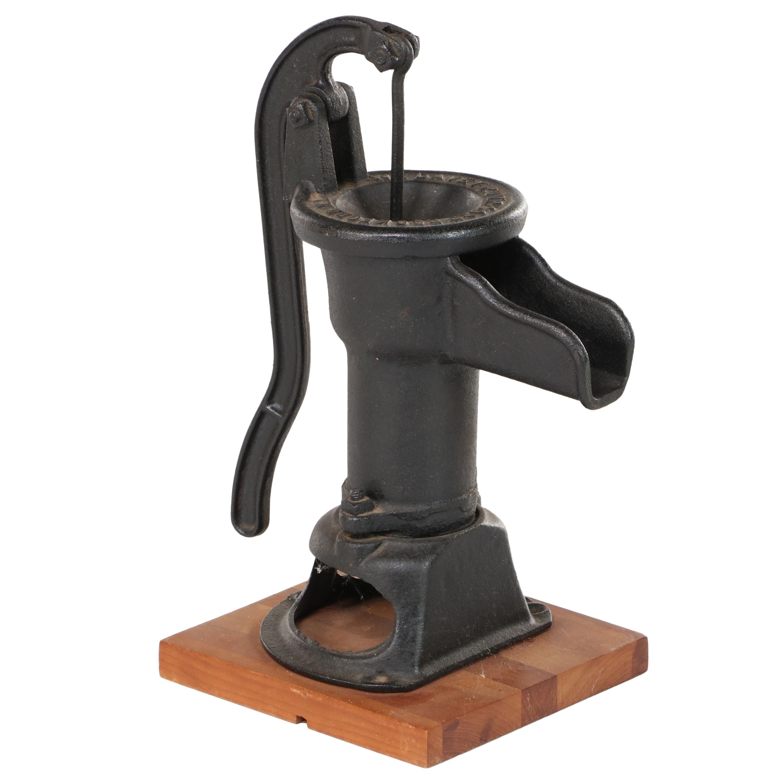 W.L. Davey Pump Corp. Cast Iron Water Hand Pump on Later Cherrywood Base