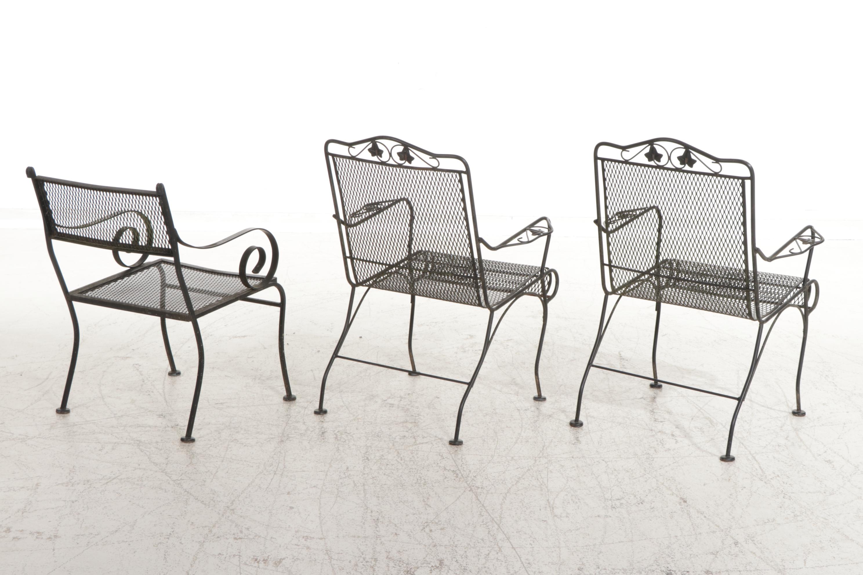 Three Black Wire Mesh Patio Armchairs and Side Table