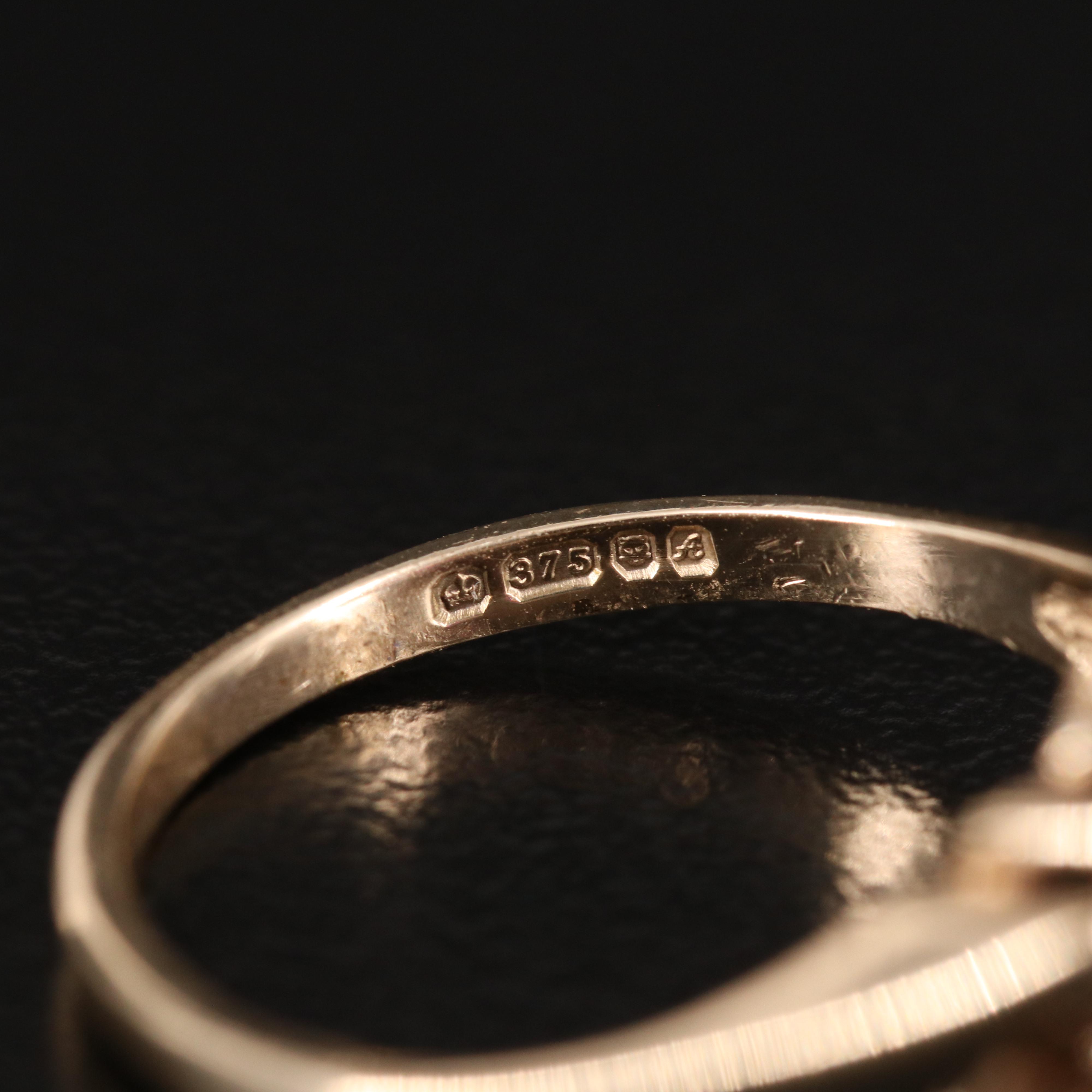 Vintage 9K Ruby Flower Ring with Pierced Shoulders