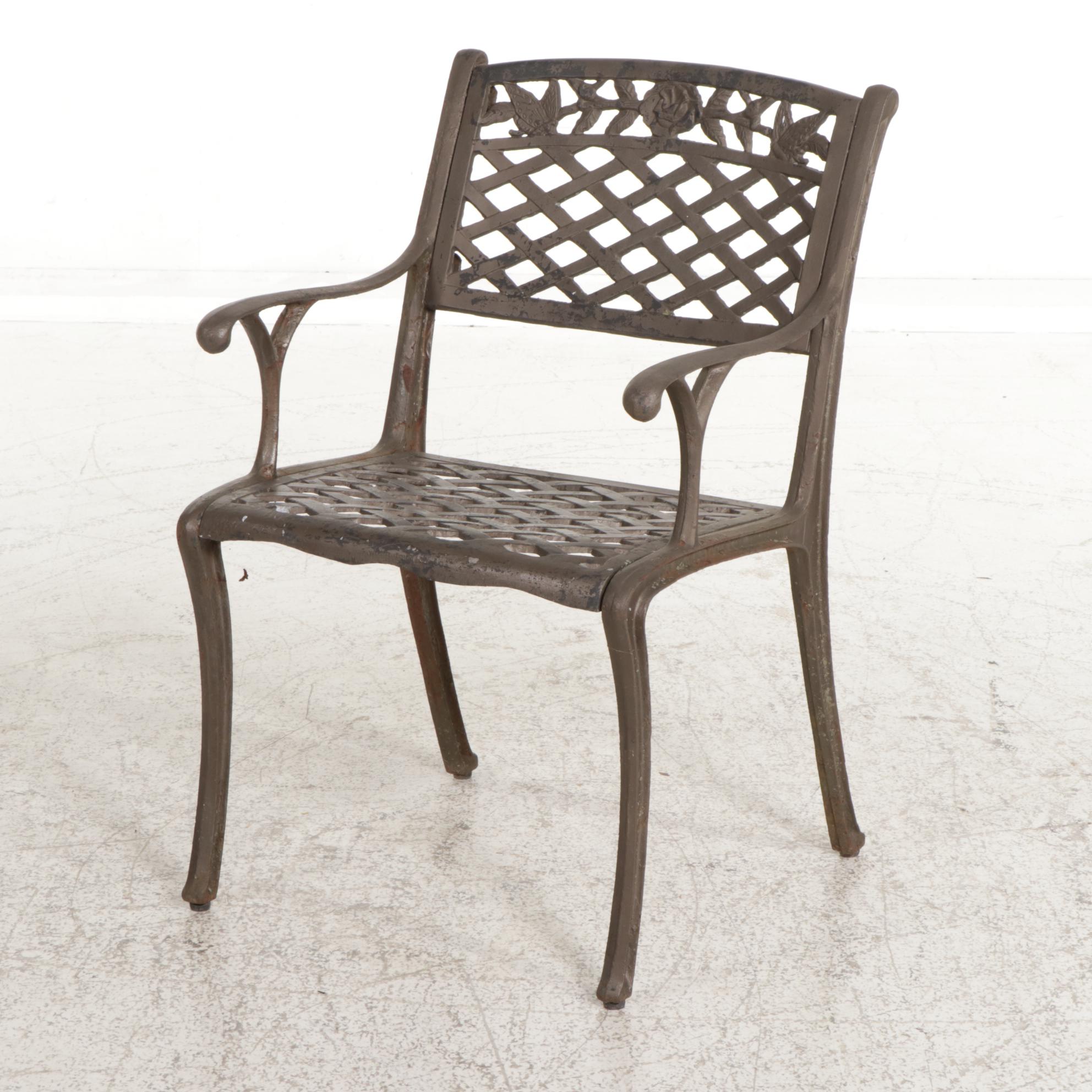 Cast Iron Five-Piece Patio Dining Set with Wicker Tiered Side Table