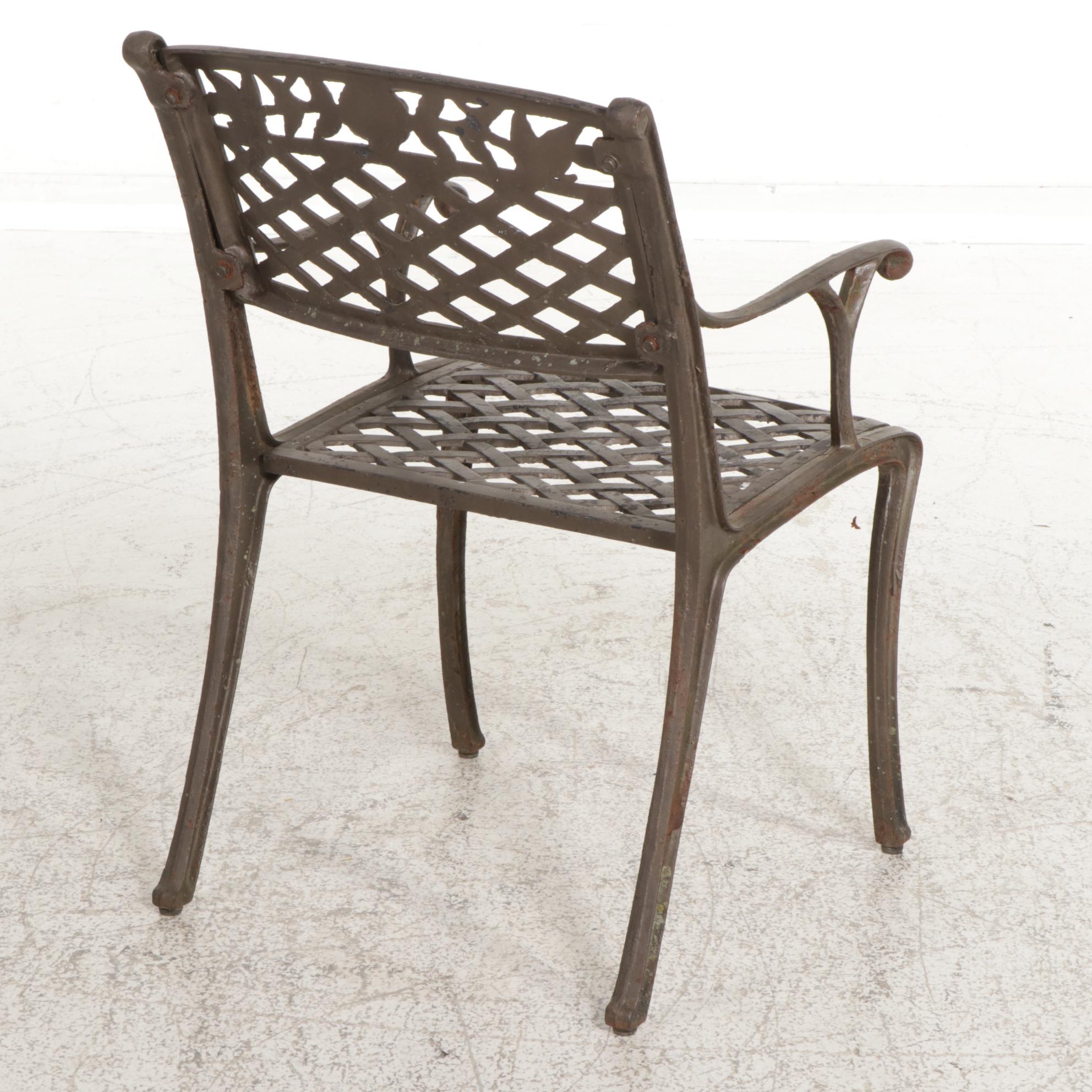 Cast Iron Five-Piece Patio Dining Set with Wicker Tiered Side Table