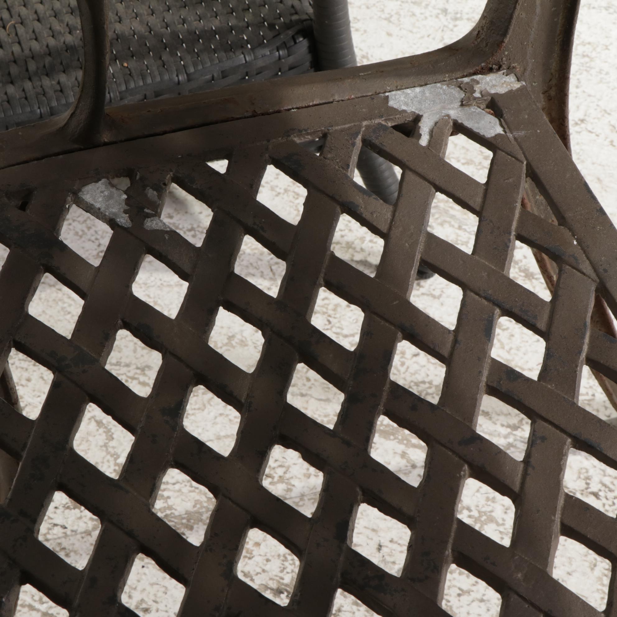 Cast Iron Five-Piece Patio Dining Set with Wicker Tiered Side Table