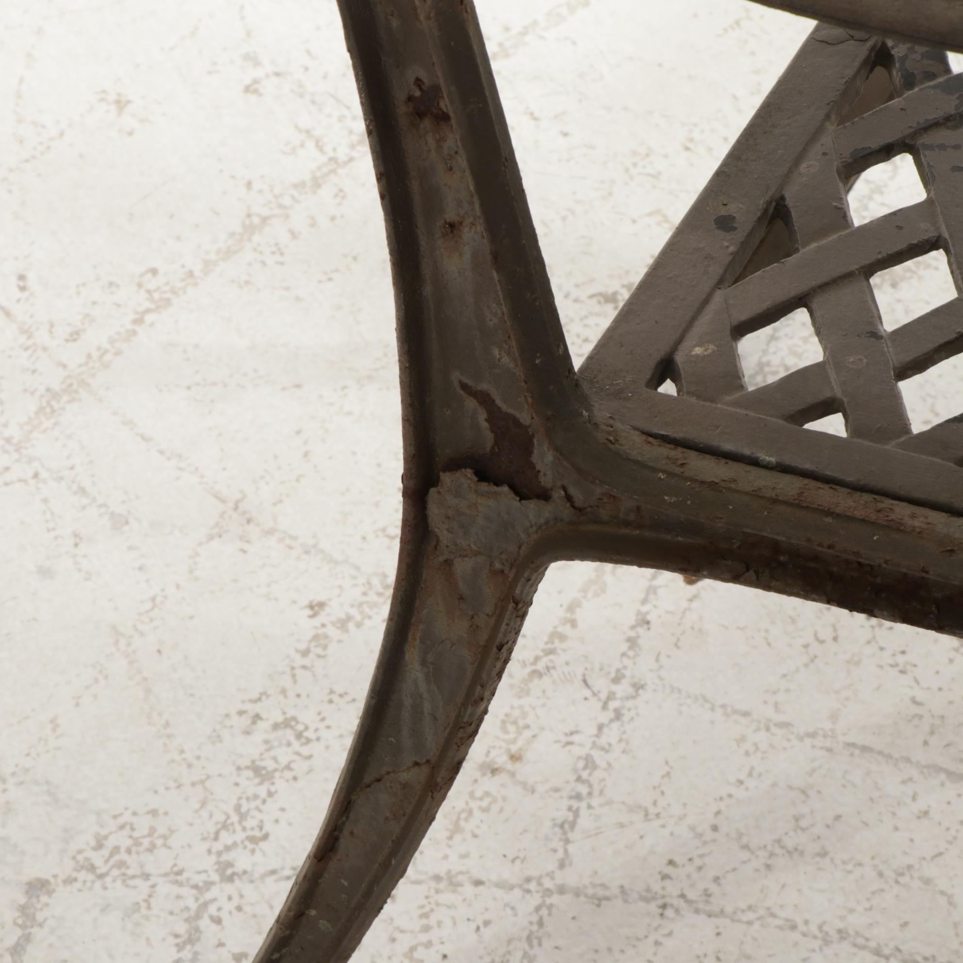 Cast Iron Five-Piece Patio Dining Set with Wicker Tiered Side Table