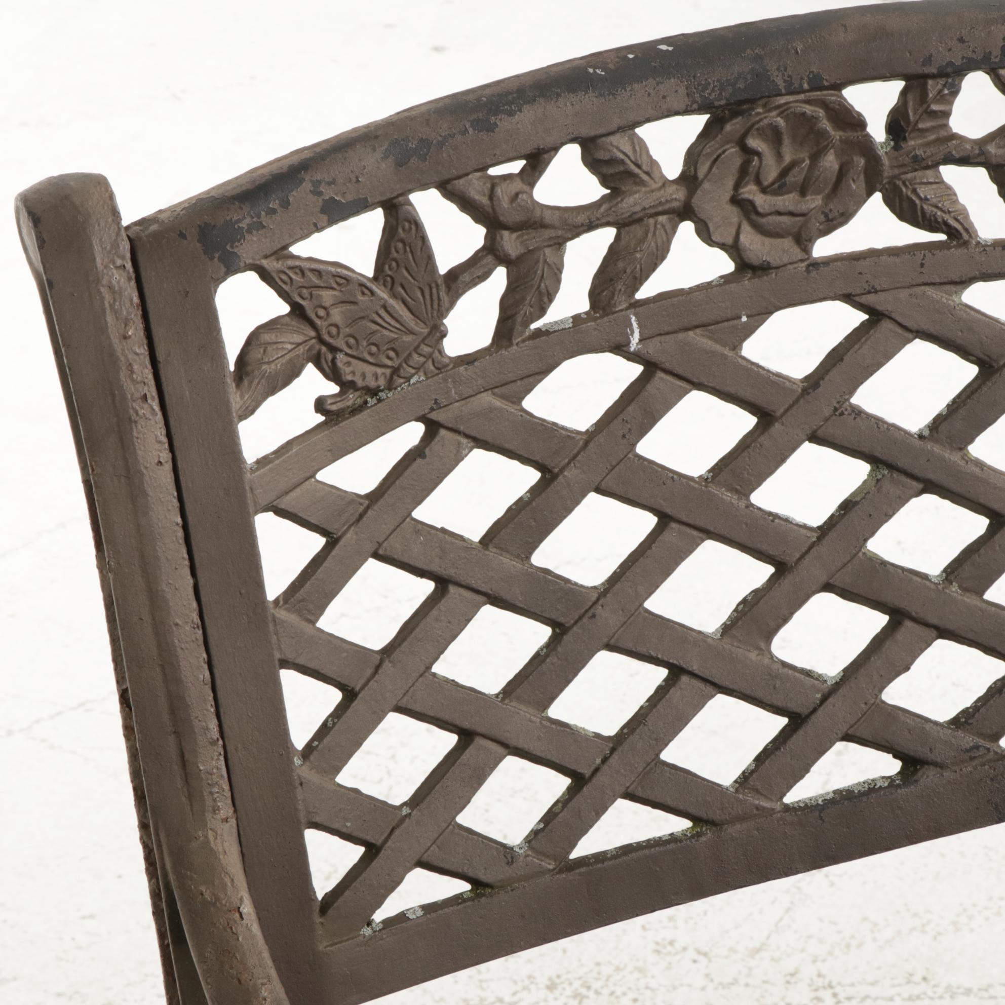 Cast Iron Five-Piece Patio Dining Set with Wicker Tiered Side Table
