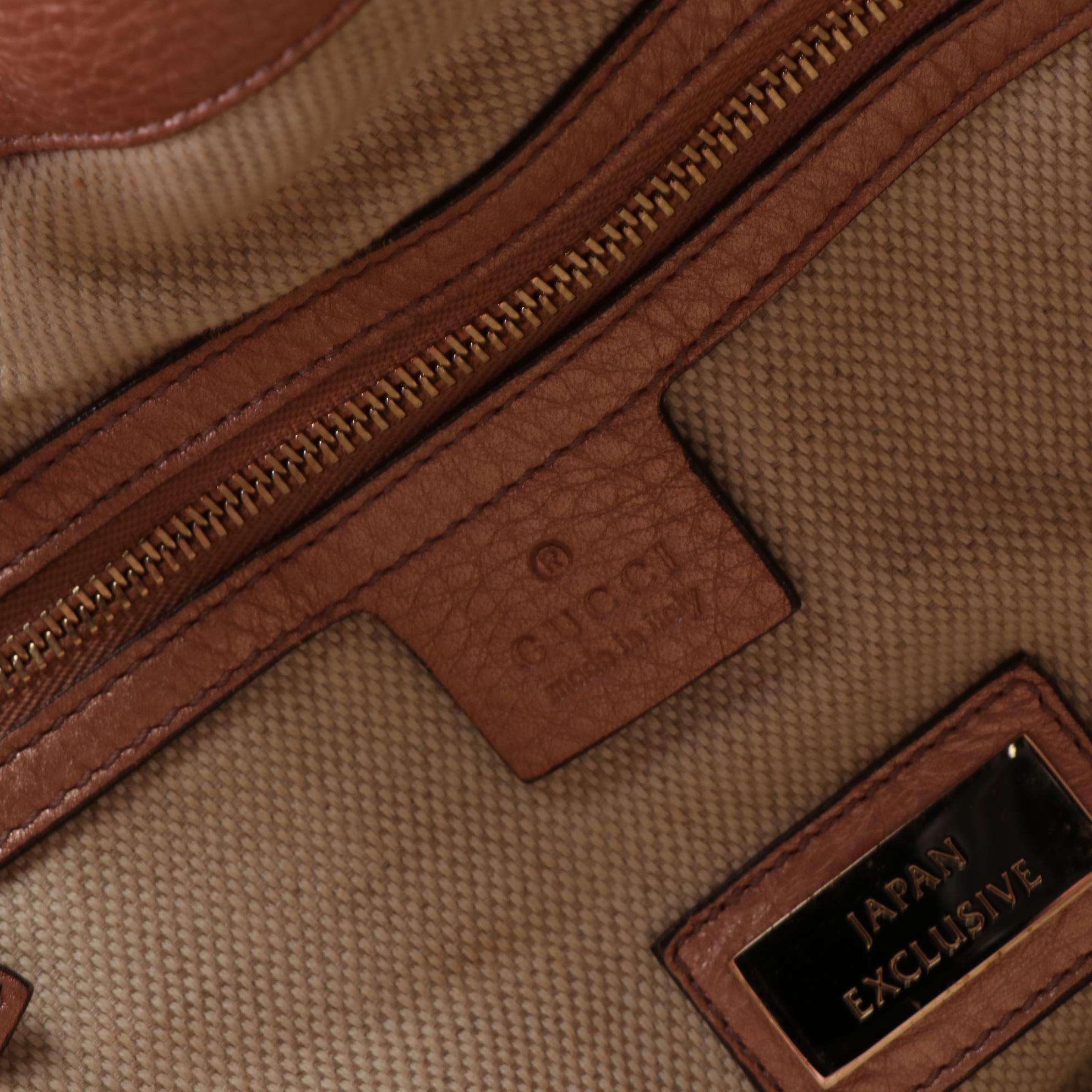 Gucci Soho Interlocking GG Hobo Bag in Metallic Leather with Fringe Tassel