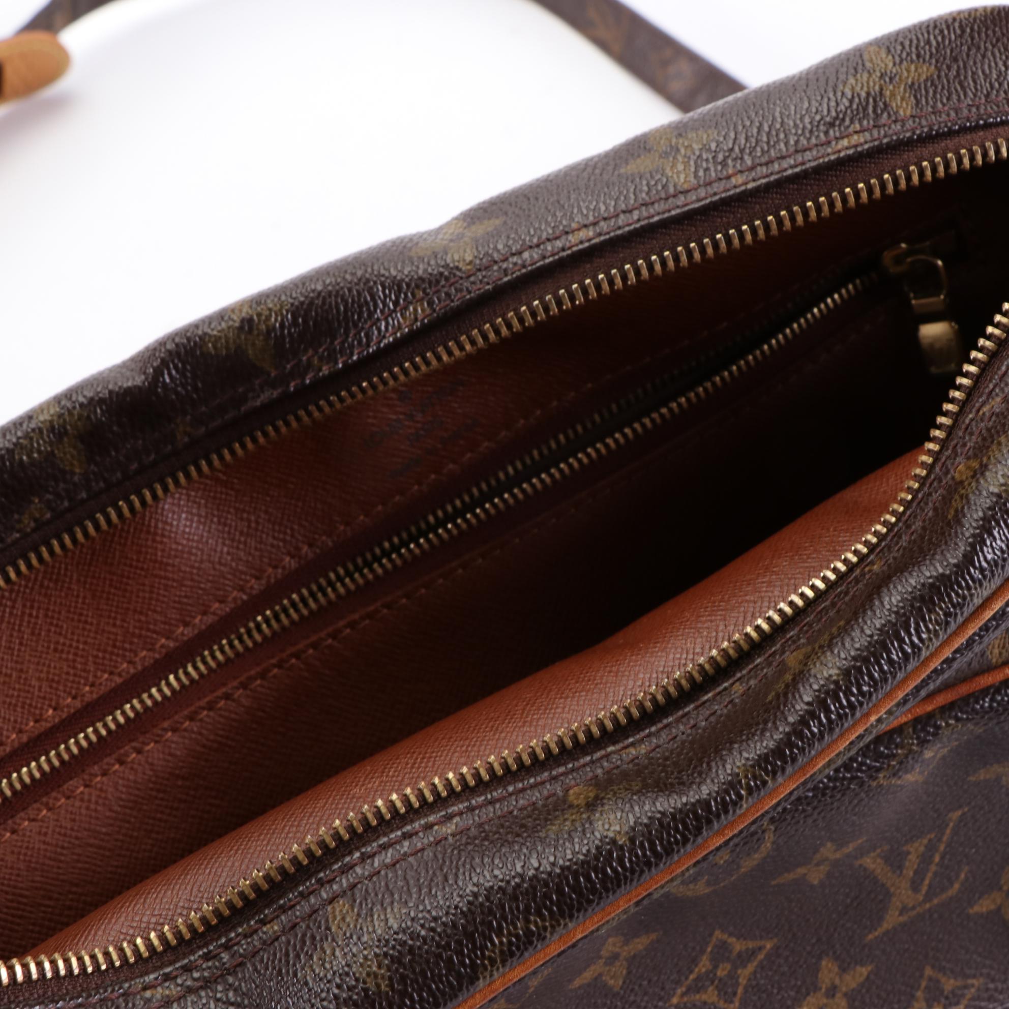 Louis Vuitton Nile Reporter Bag in Monogram Canvas and Vachetta Leather
