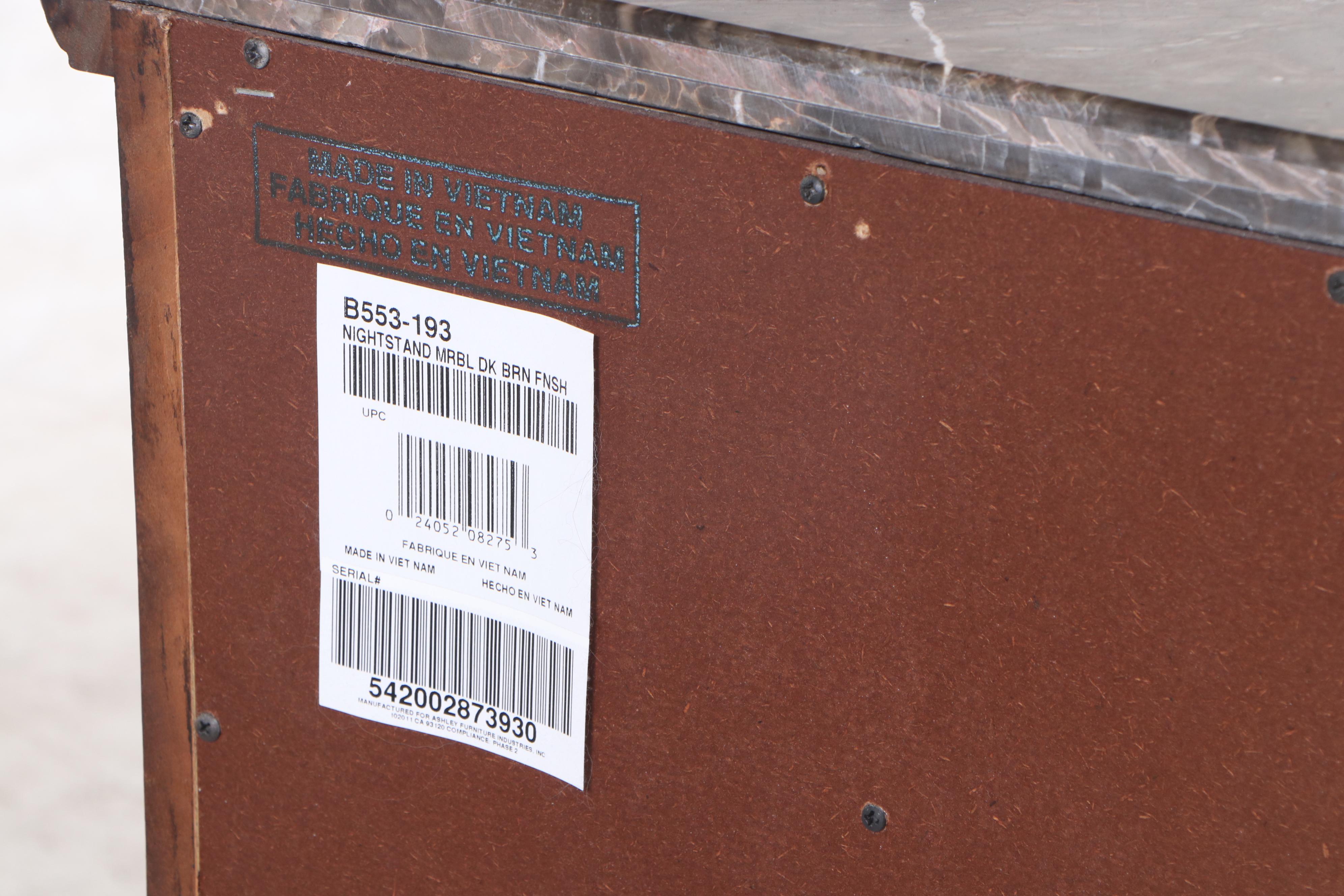 Pair of Ashley Furniture "North Shore" Marble-Top Three-Drawer Nightstands