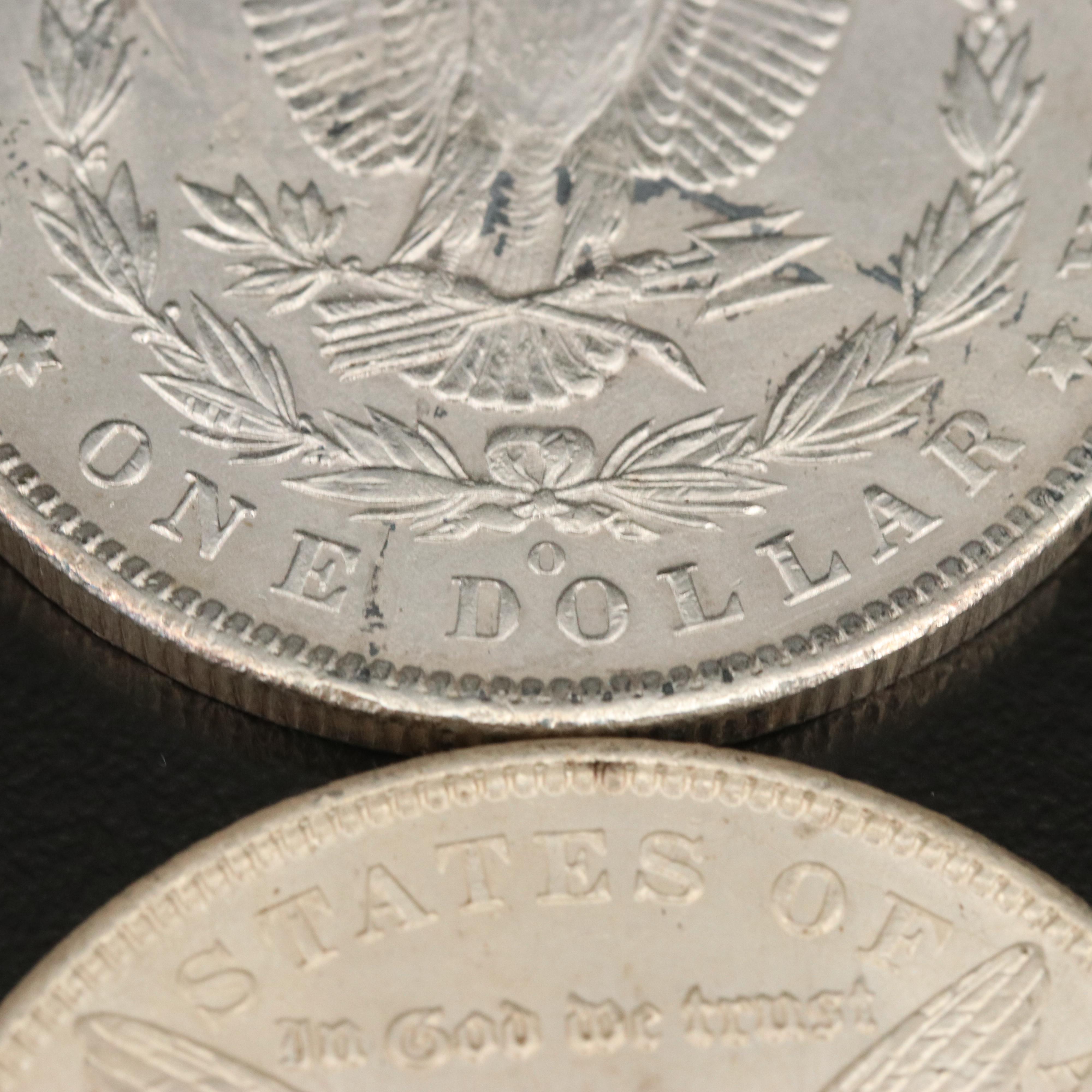Eight Morgan Silver Dollars, Including 1897
