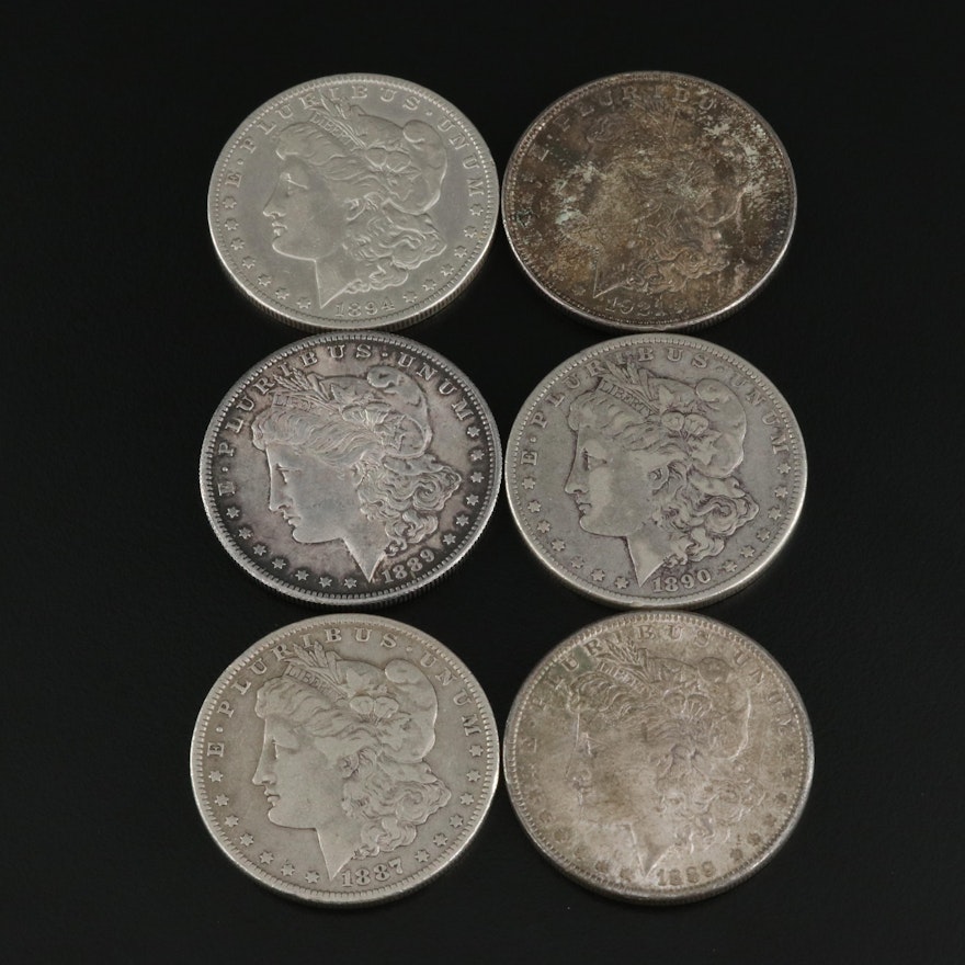 Group of Six Silver Morgan Dollars