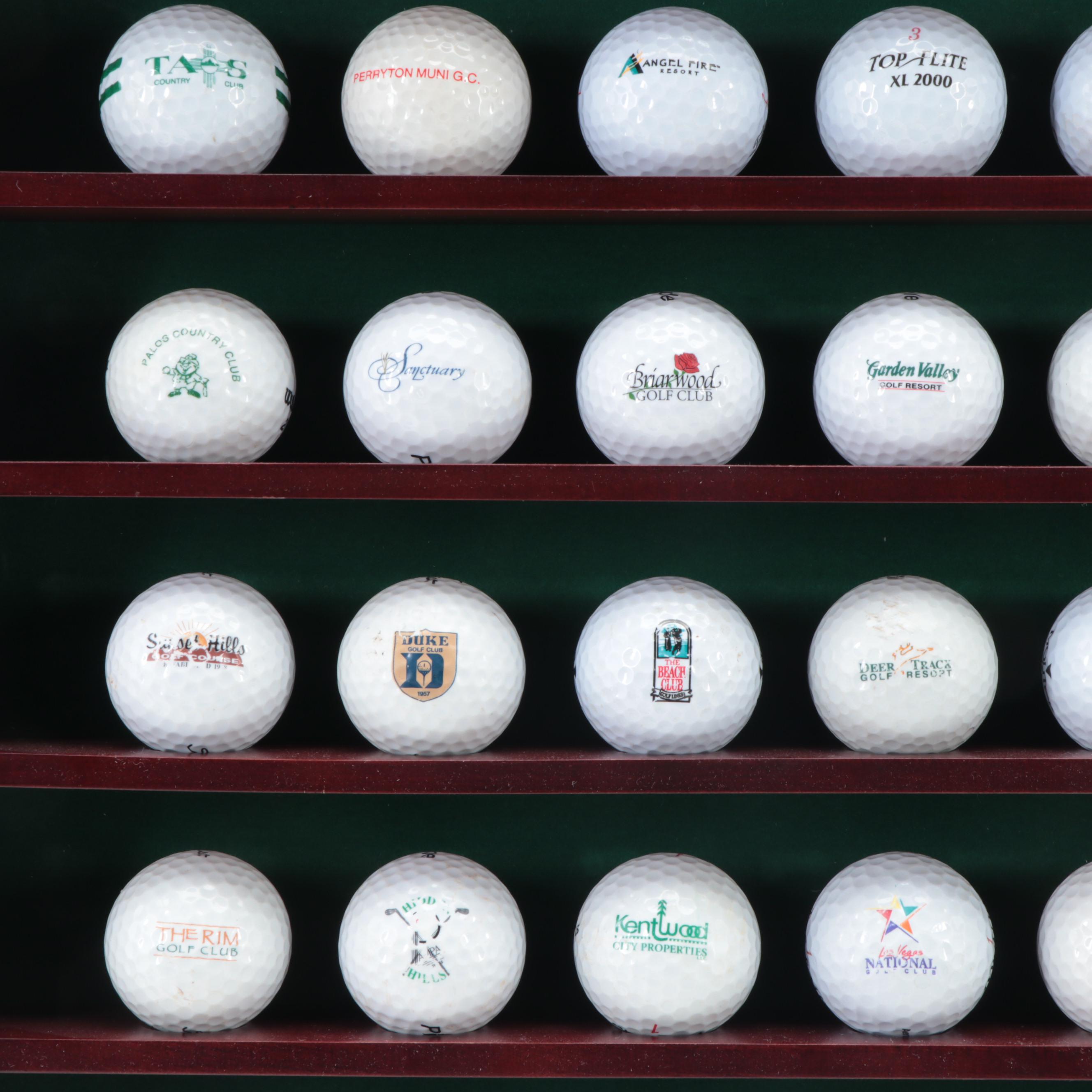 Collection of Novelty and Souvenir Golf Balls in Wood Display Case