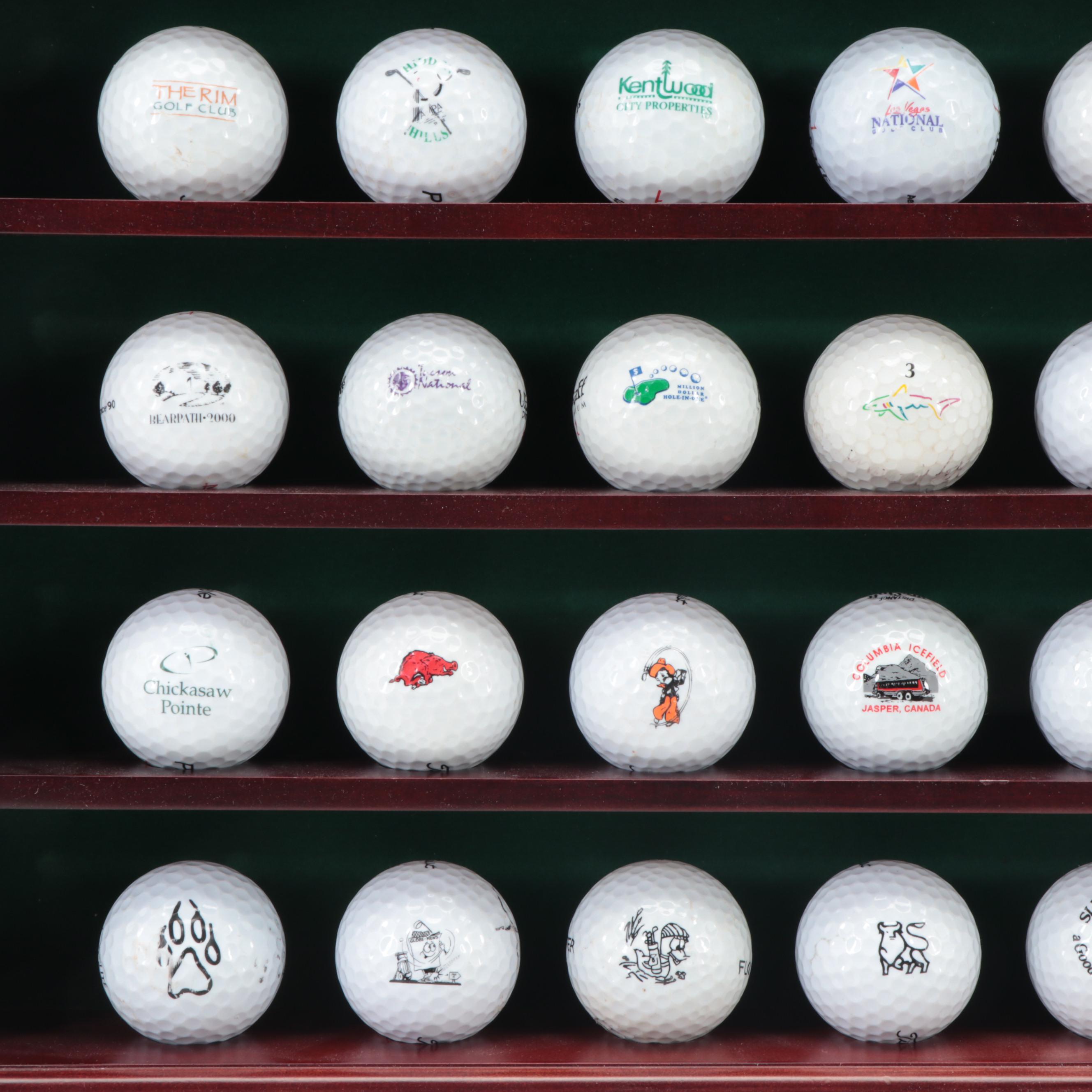 Collection of Novelty and Souvenir Golf Balls in Wood Display Case
