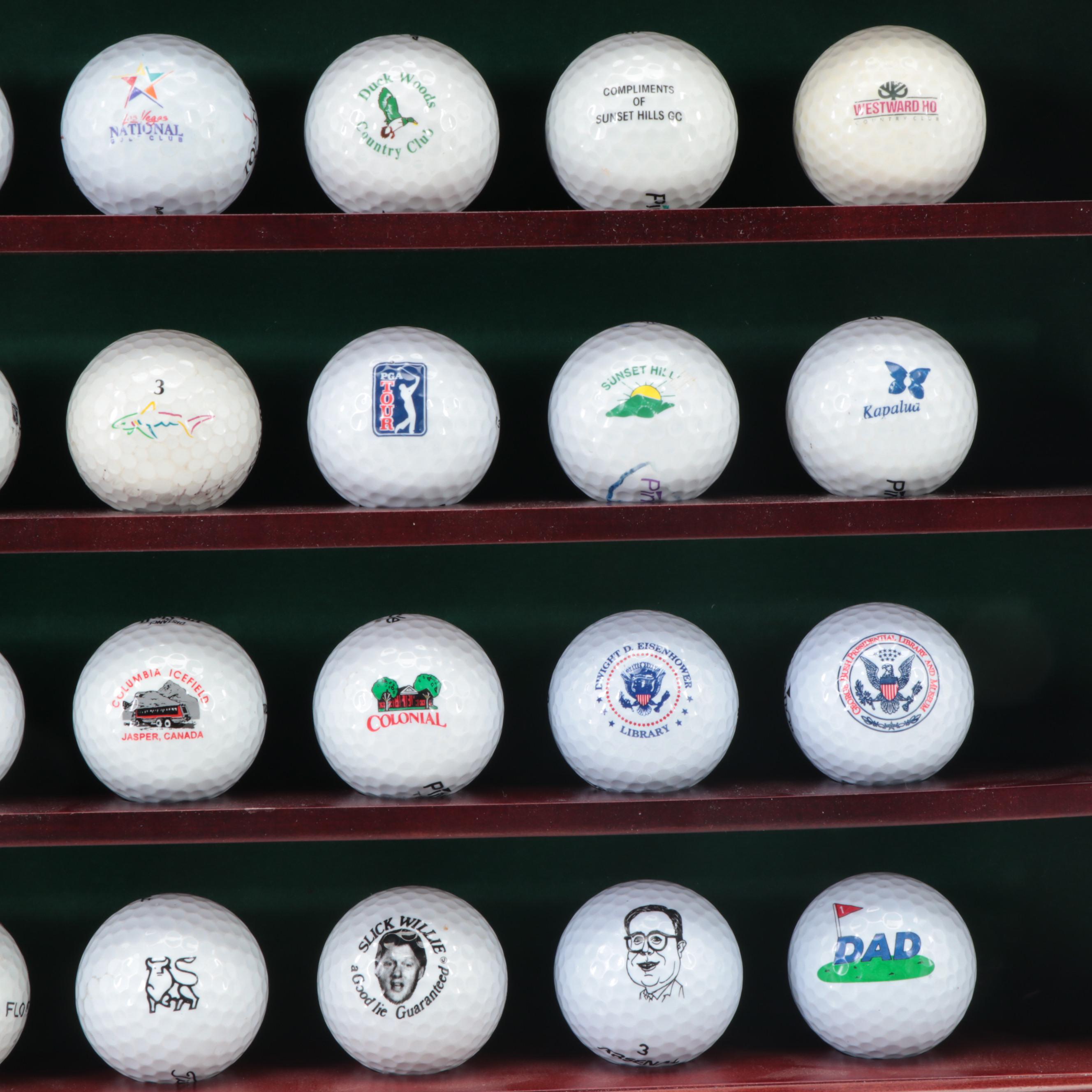 Collection of Novelty and Souvenir Golf Balls in Wood Display Case