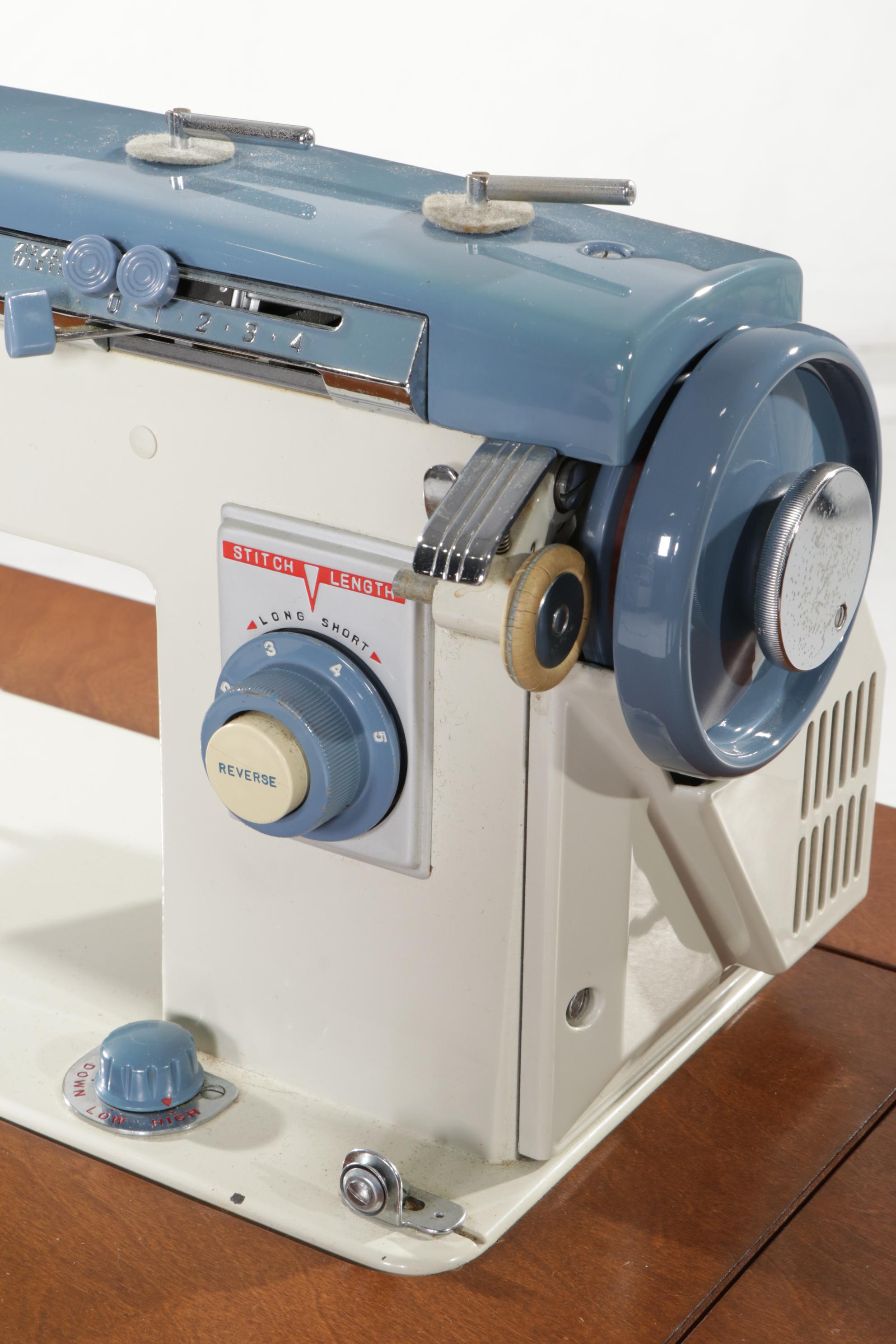 White "Zigzag" Model 167 Sewing Machine in Four-Drawer Cabinet, Mid-20th Century