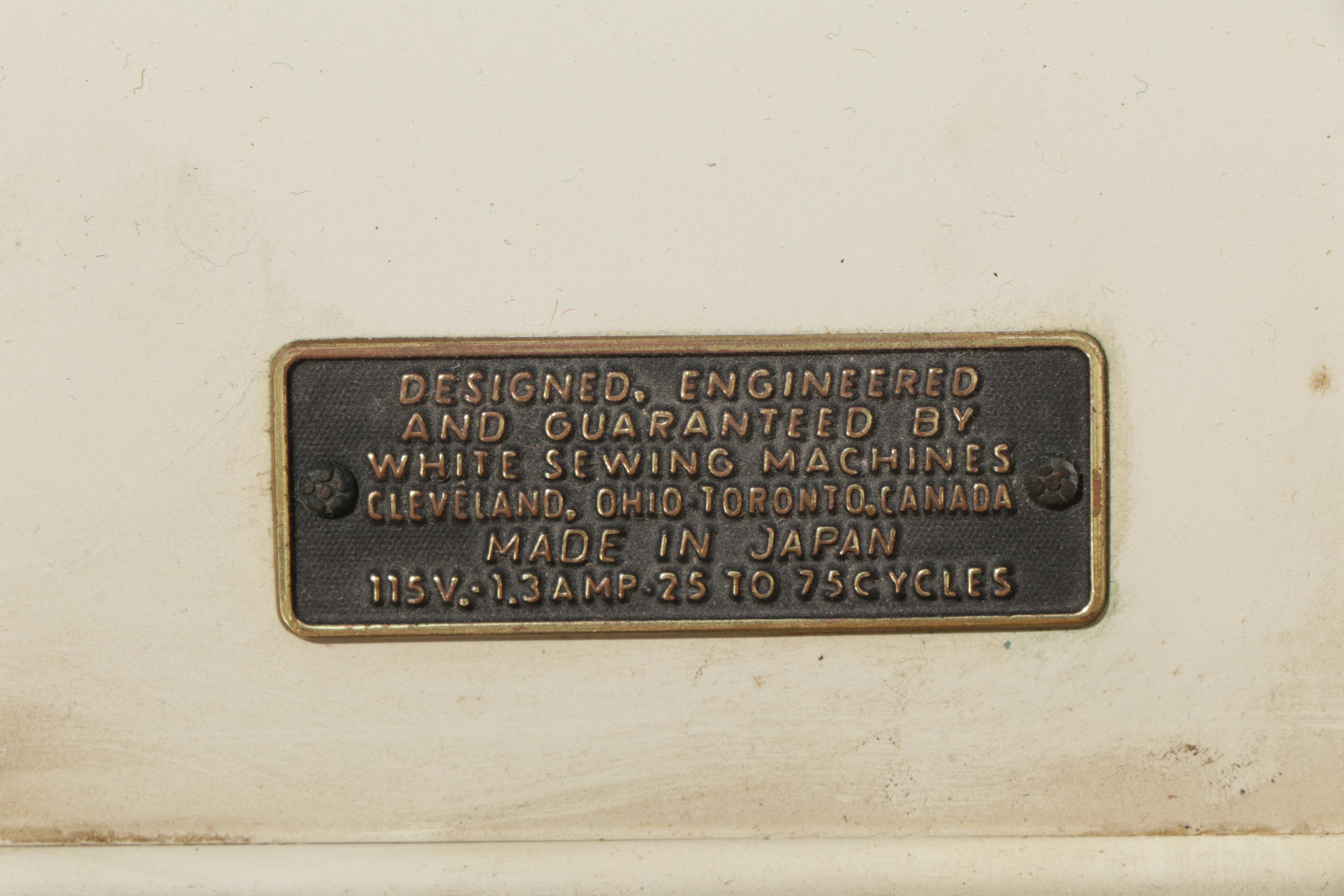 White "Zigzag" Model 167 Sewing Machine in Four-Drawer Cabinet, Mid-20th Century