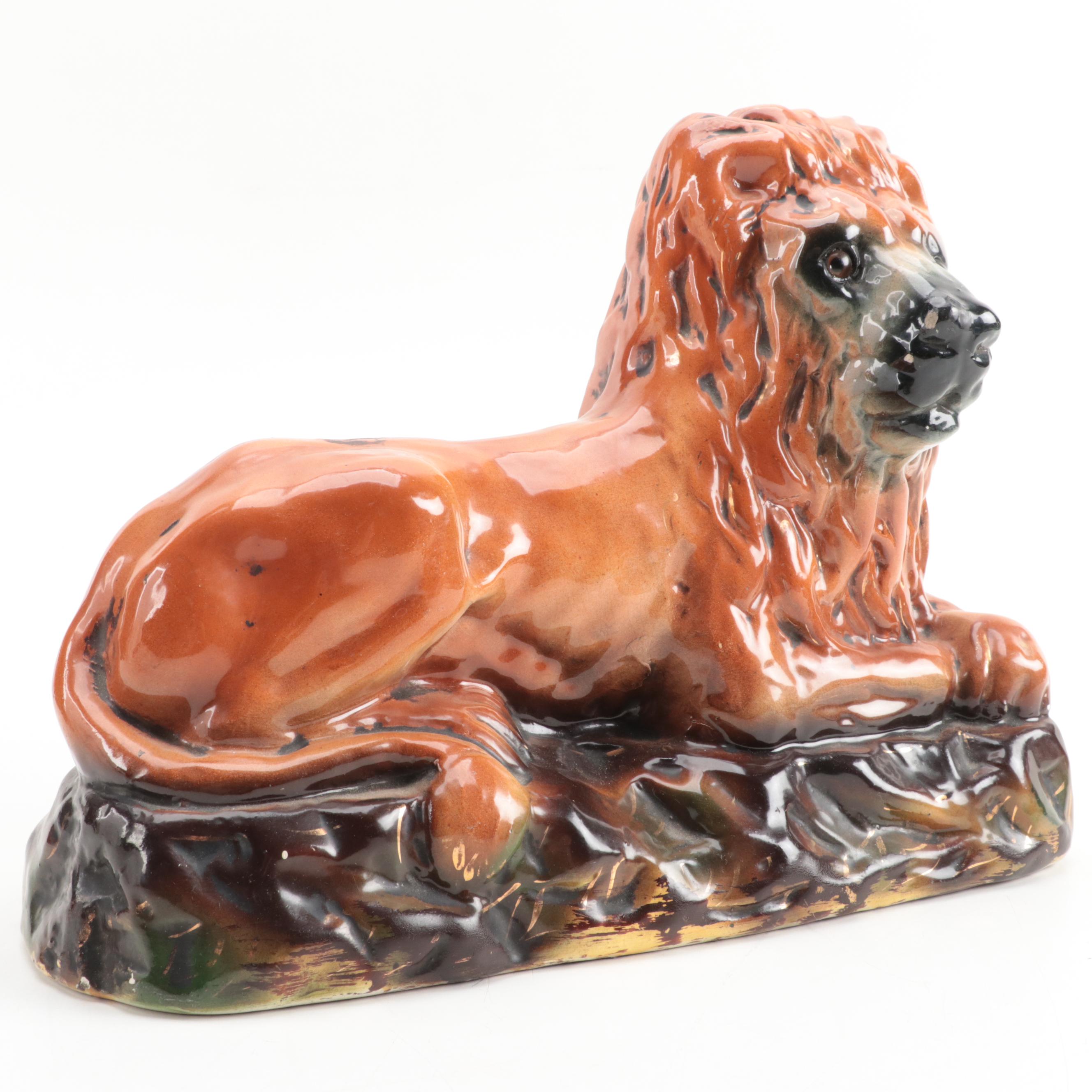 Staffordshire Recumbent Lion Figurine with Glass Eyes, 20th Century