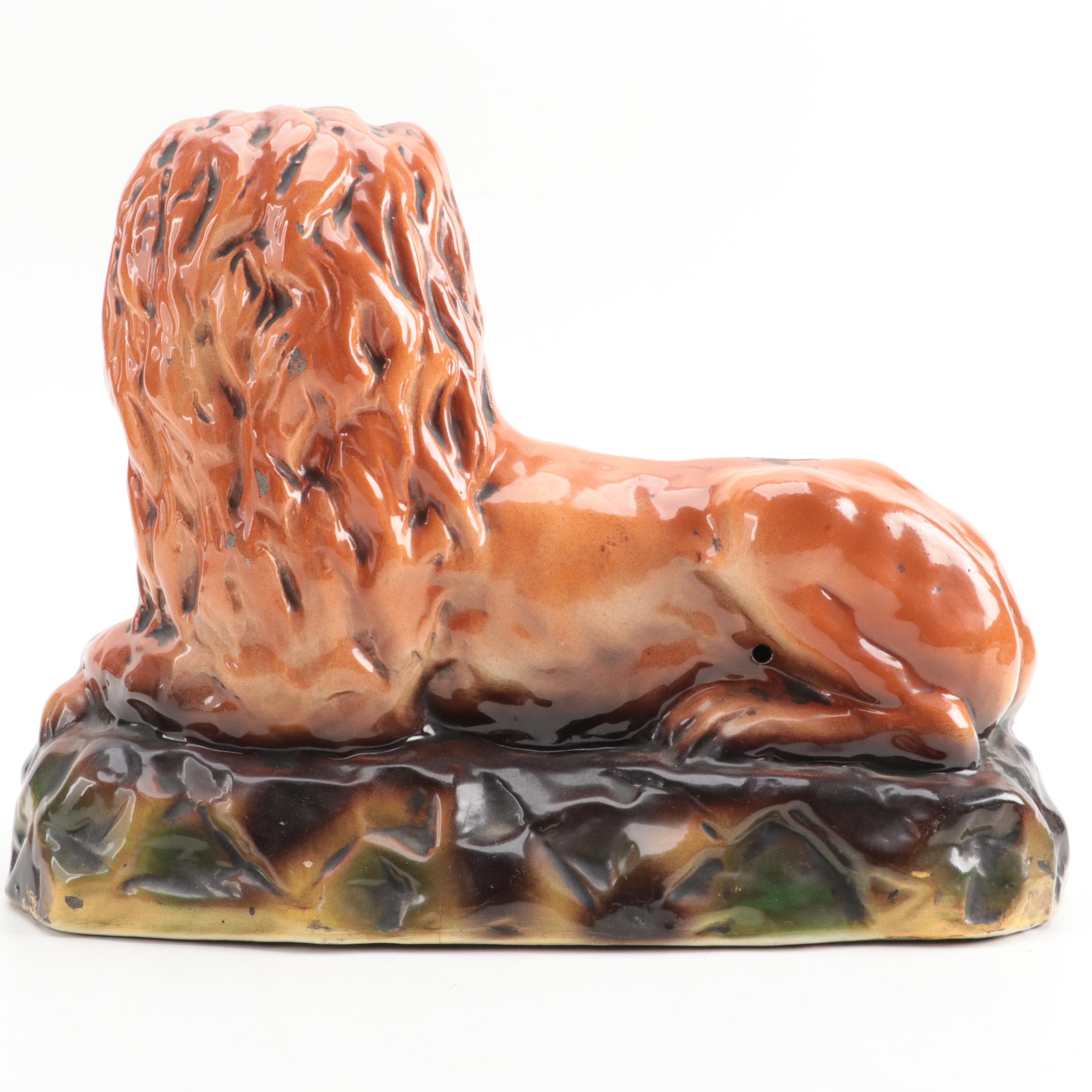 Staffordshire Recumbent Lion Figurine with Glass Eyes, 20th Century