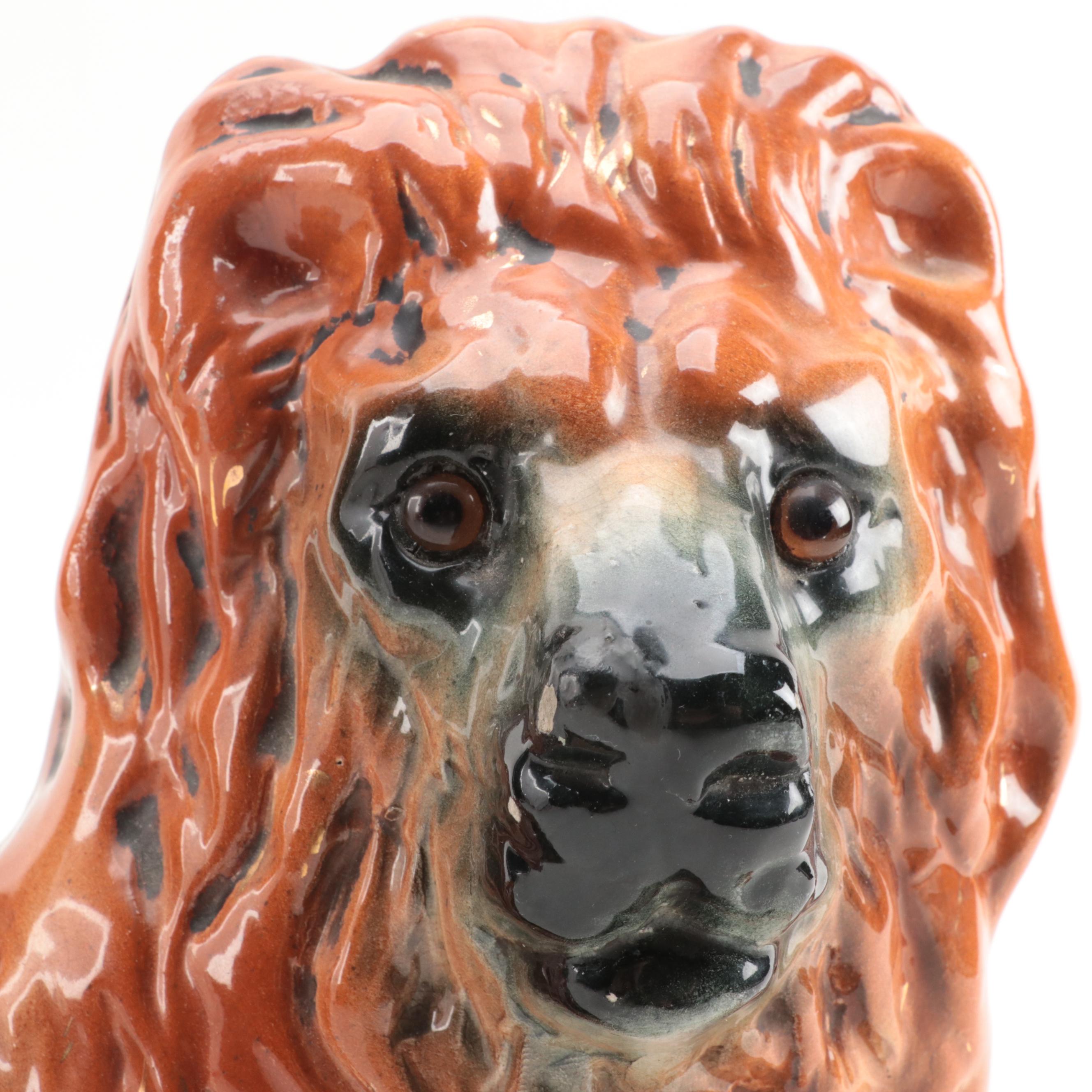 Staffordshire Recumbent Lion Figurine with Glass Eyes, 20th Century
