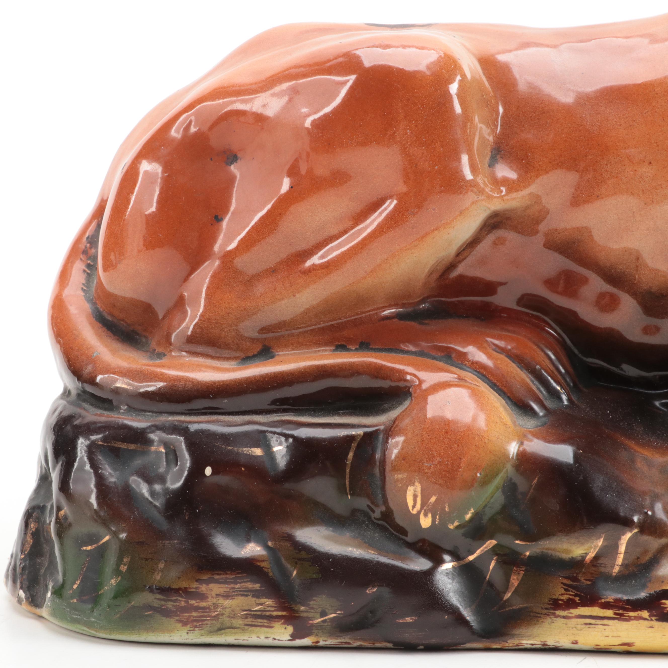 Staffordshire Recumbent Lion Figurine with Glass Eyes, 20th Century