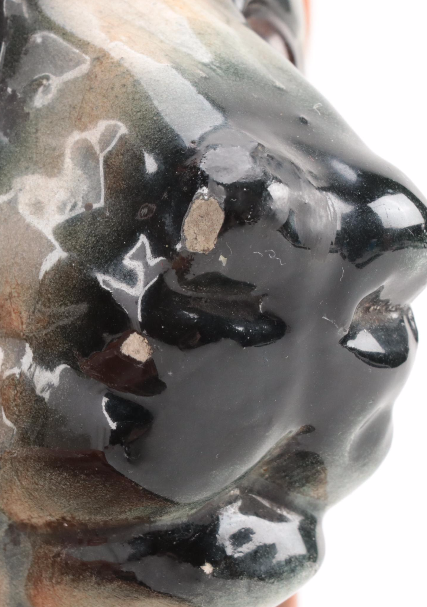 Staffordshire Recumbent Lion Figurine with Glass Eyes, 20th Century