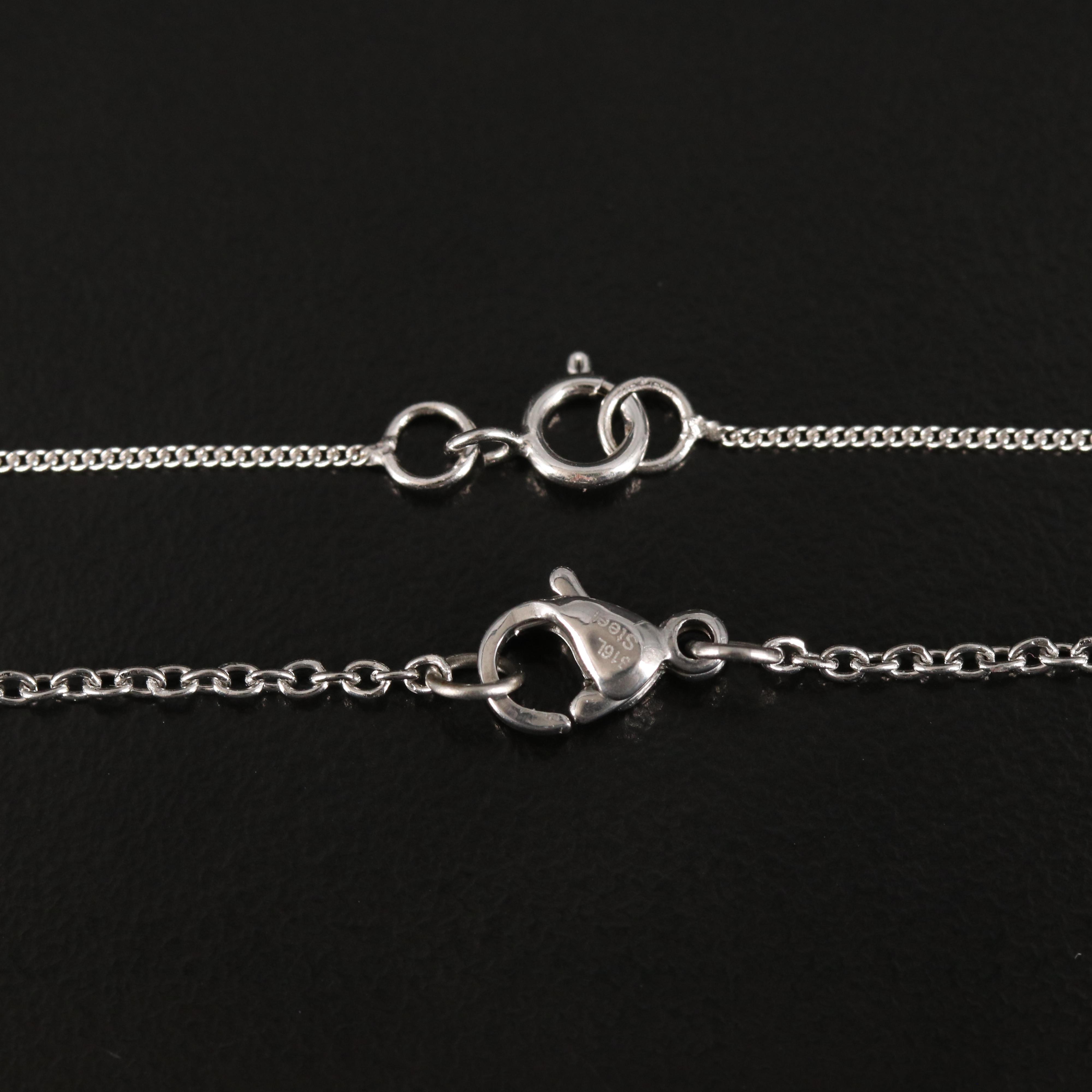 Sterling Pendant Necklaces Including Corundum, Diamonds and Emeralds