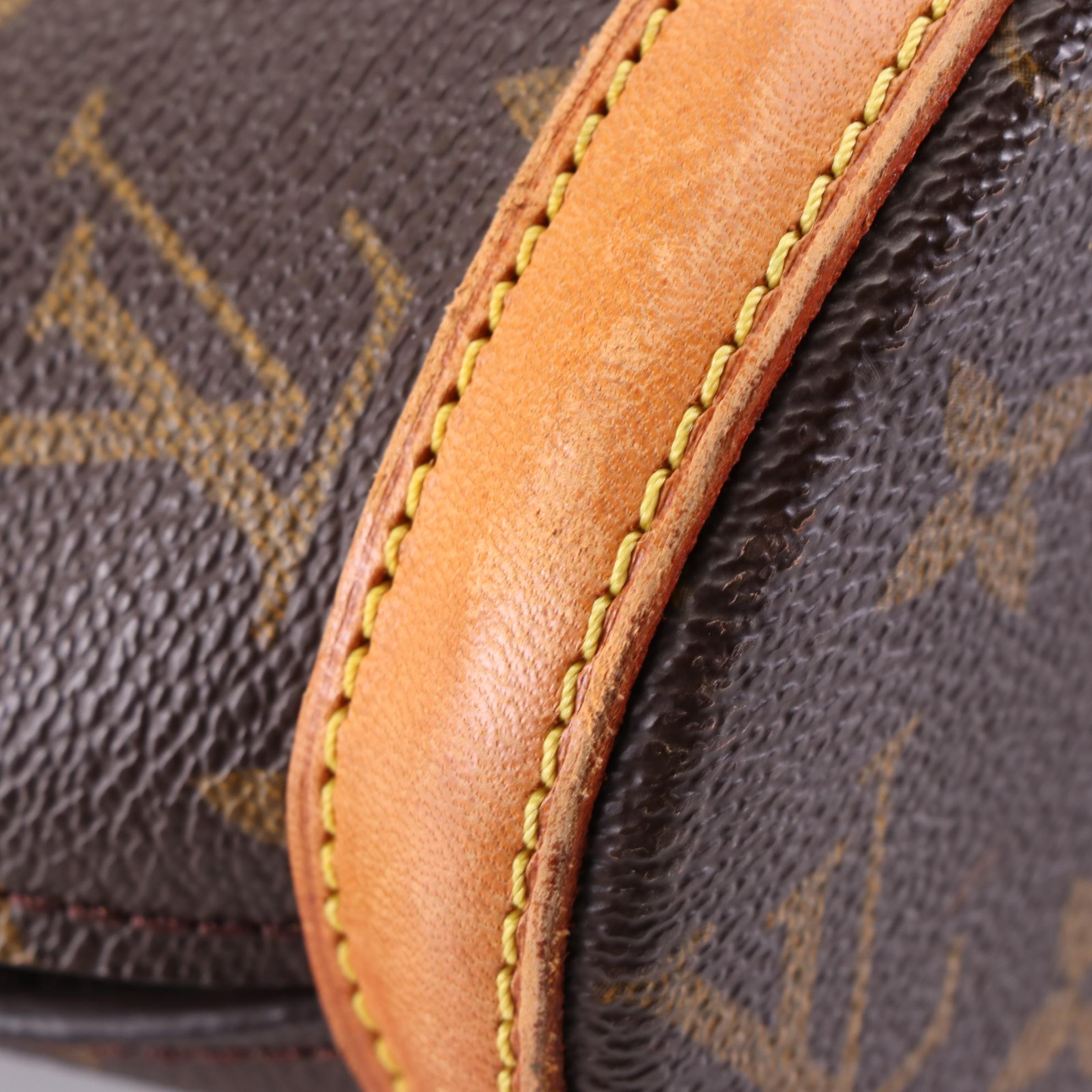 Louis Vuitton Babylone Bag in Monogram Canvas and Leather