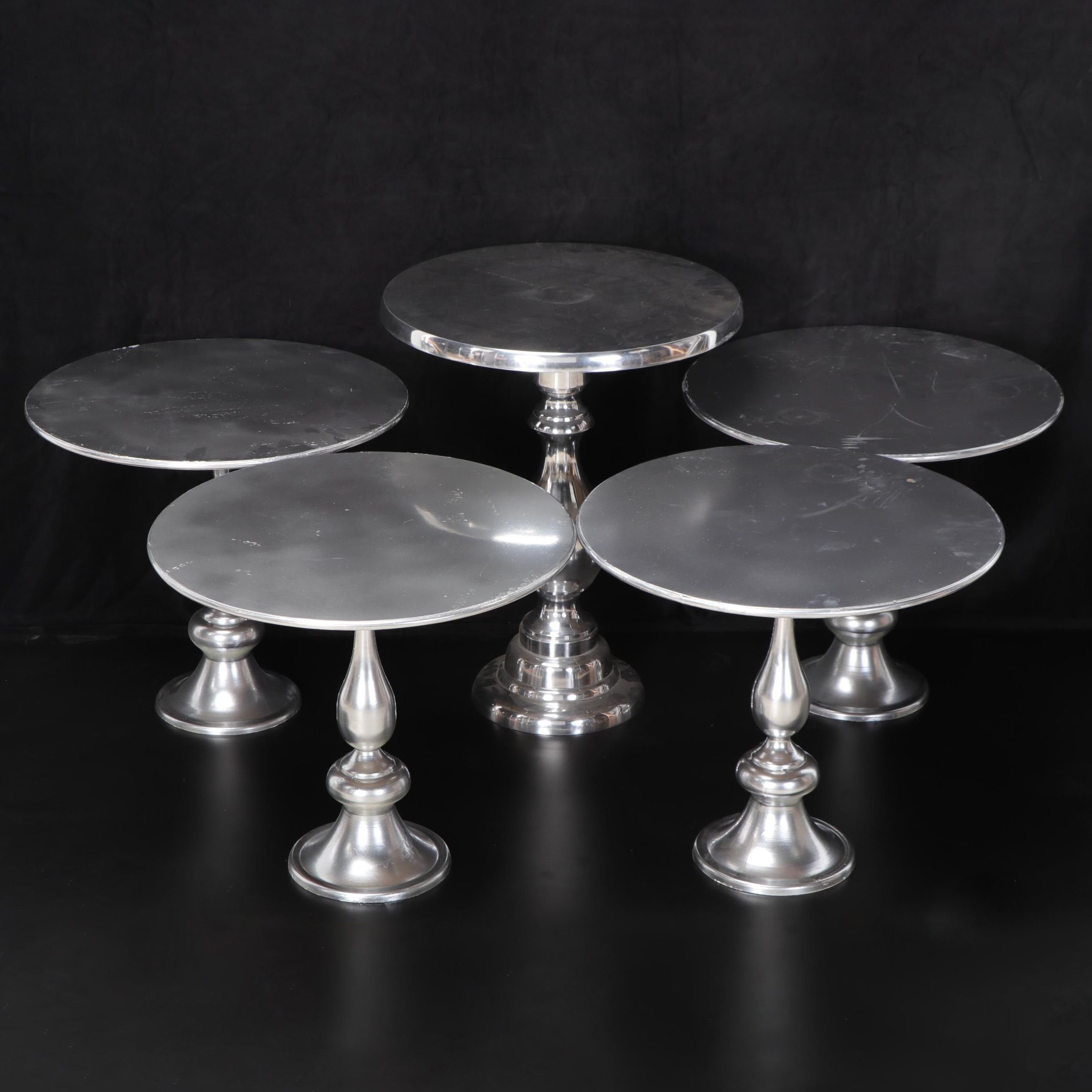 Five Contemporary Small Turned Metal Accent Tables