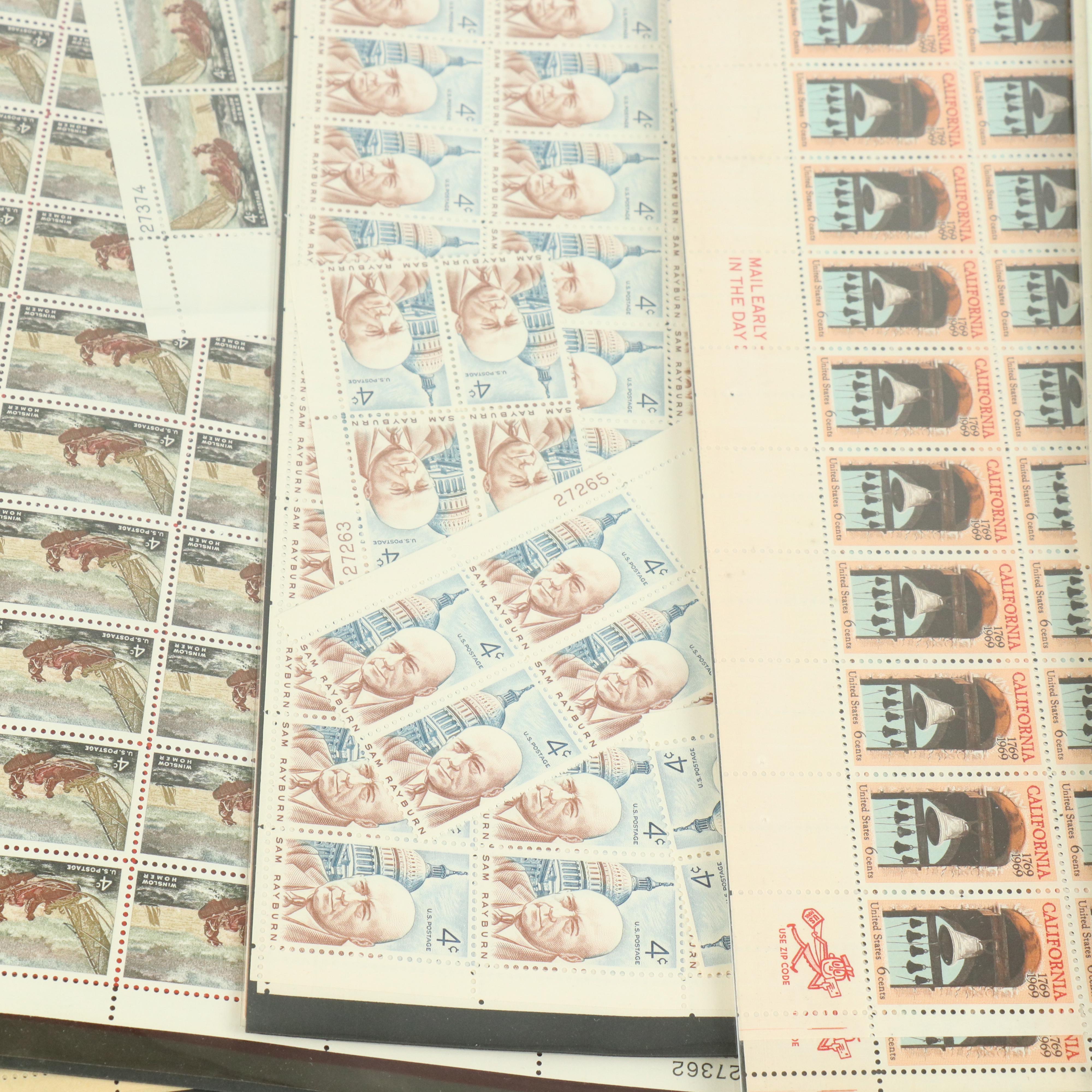 Fifty-Seven Vintage U.S. Postage Stamp Sheets