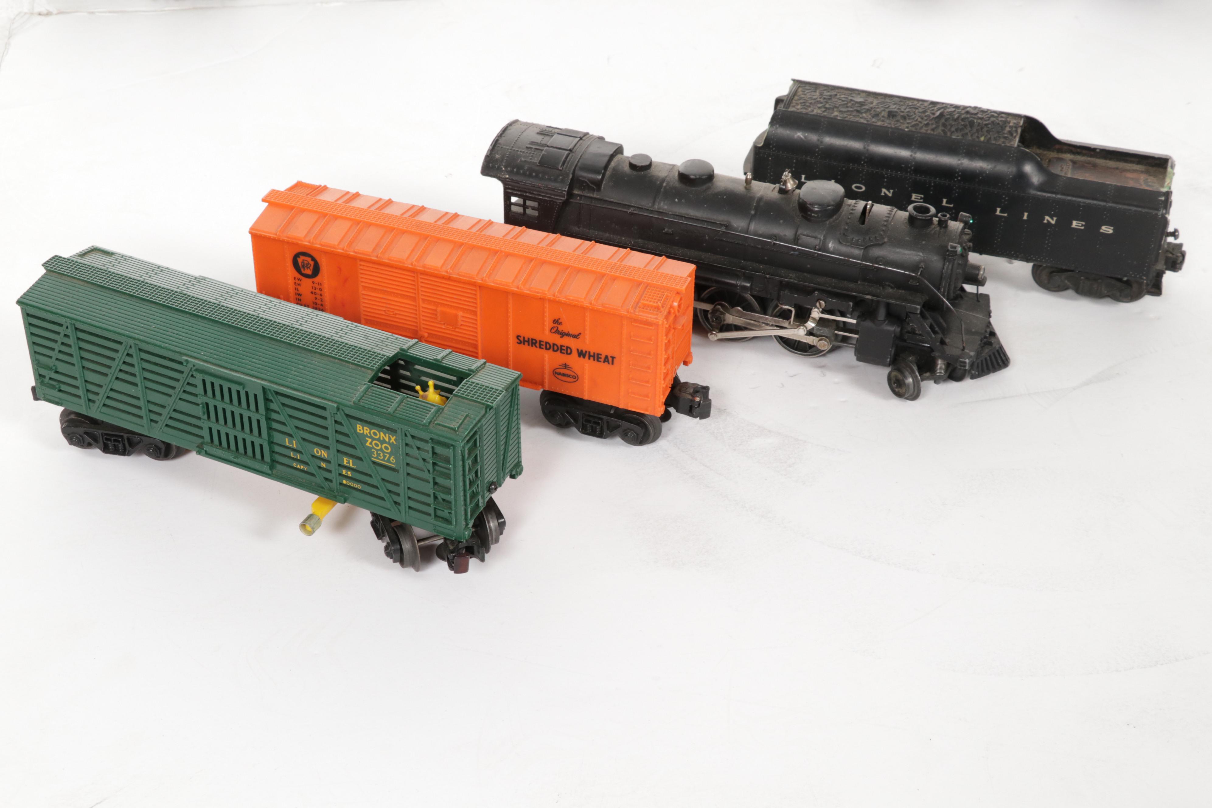Lionel Post-War O Scale Model Train Cars, Track and Books