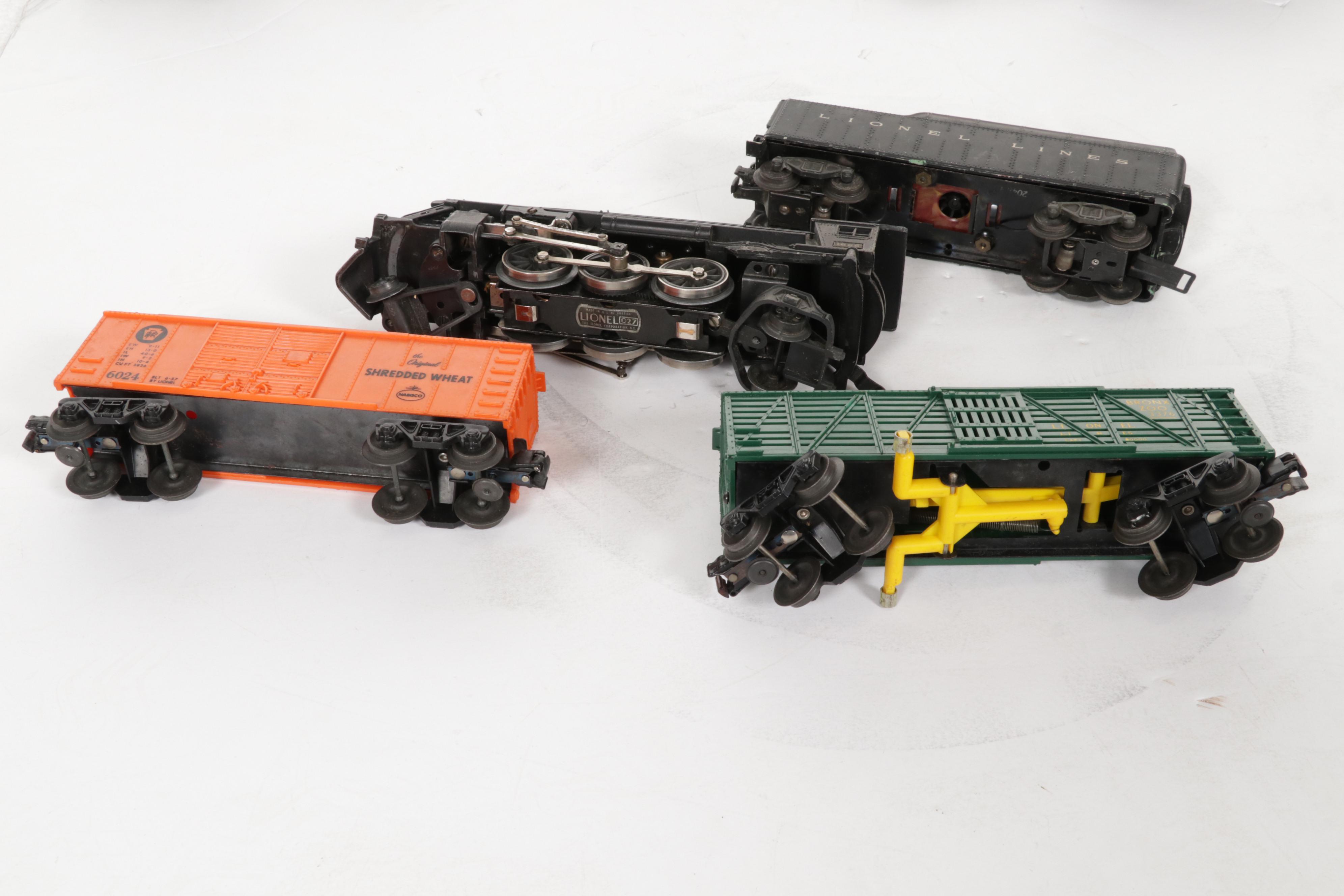 Lionel Post-War O Scale Model Train Cars, Track and Books
