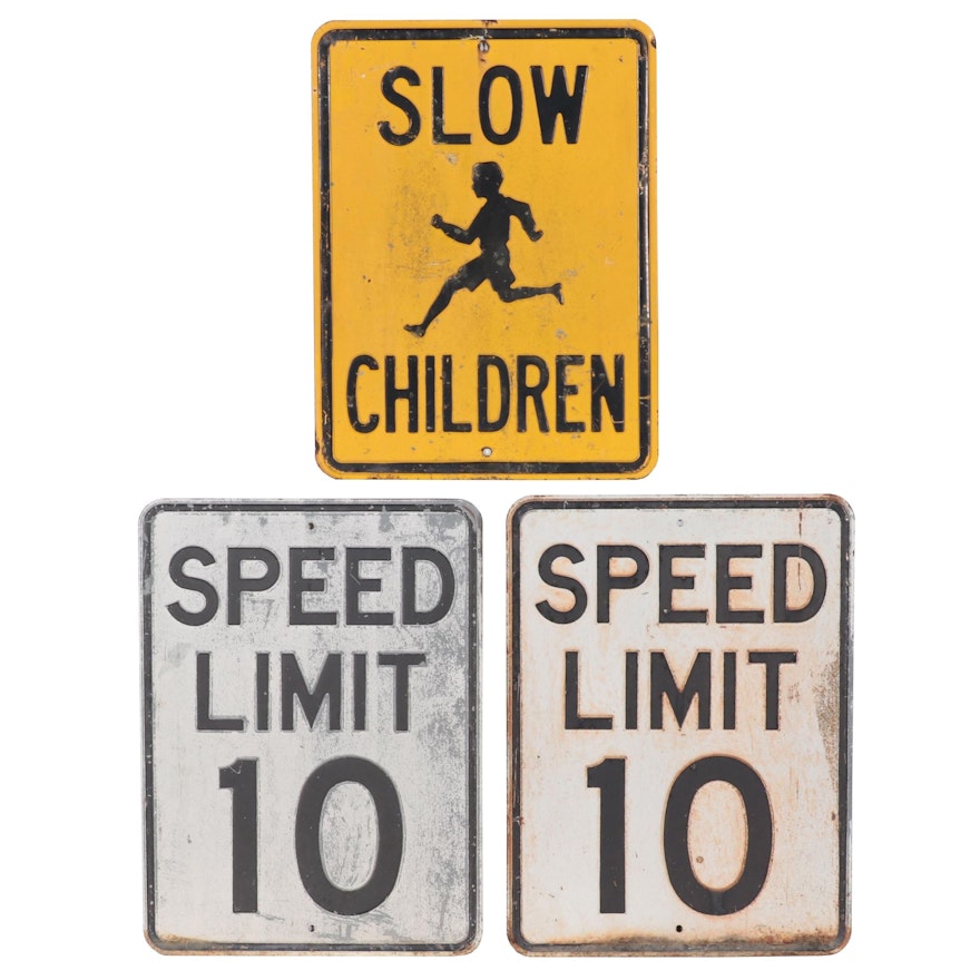 Speed Limit and Children Crossing Street Signs