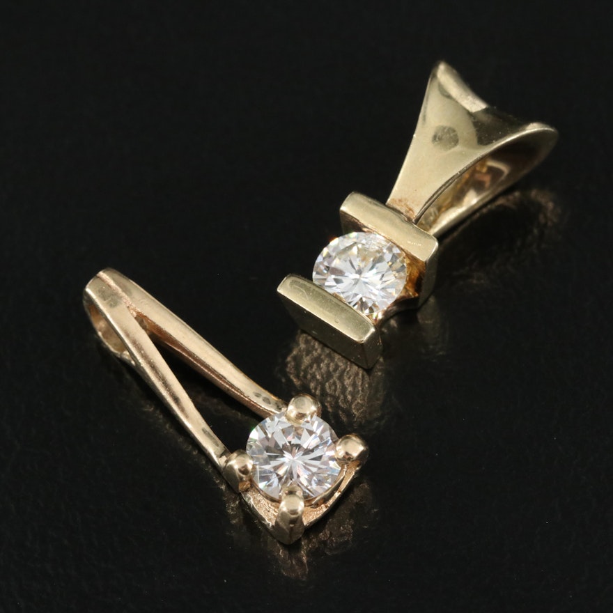 Pair of 14K Diamond Solitaire Pendants