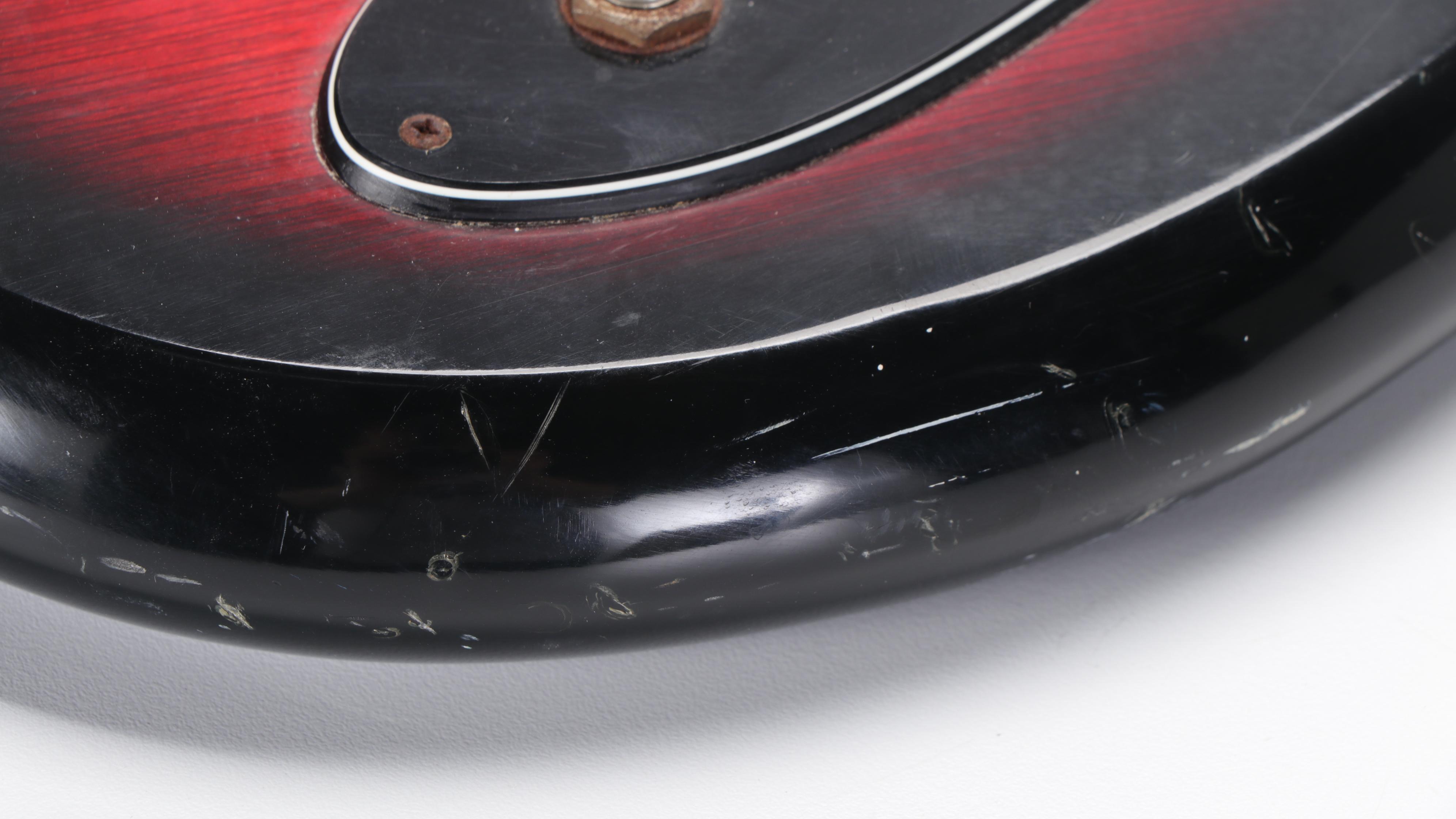 Six-String Red and Black Electric Guitar