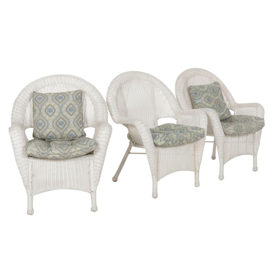 Three White Synthetic Wicker Patio Armchairs with Cushions