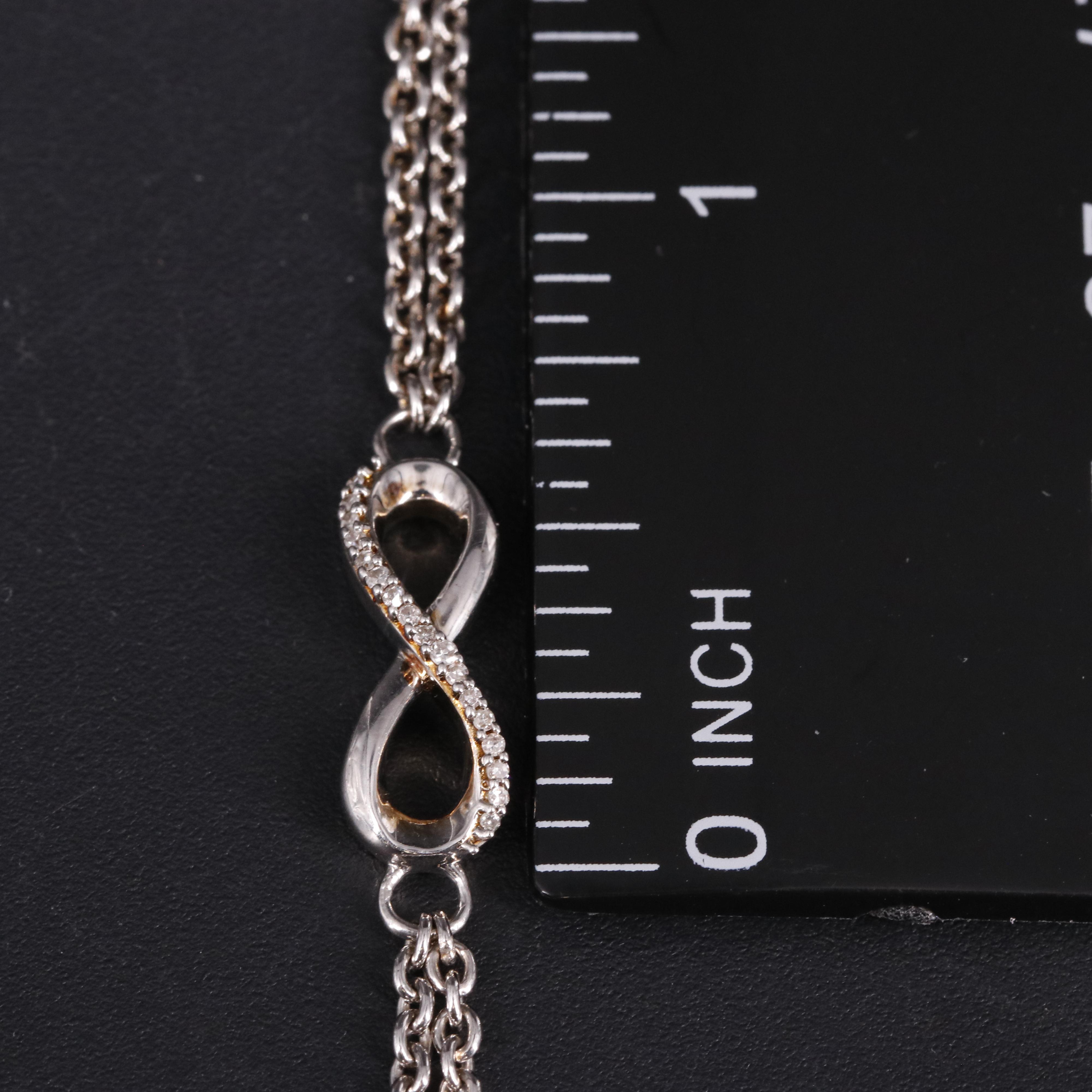 Sterling 0.05 CTW Diamond Infinity Bracelet