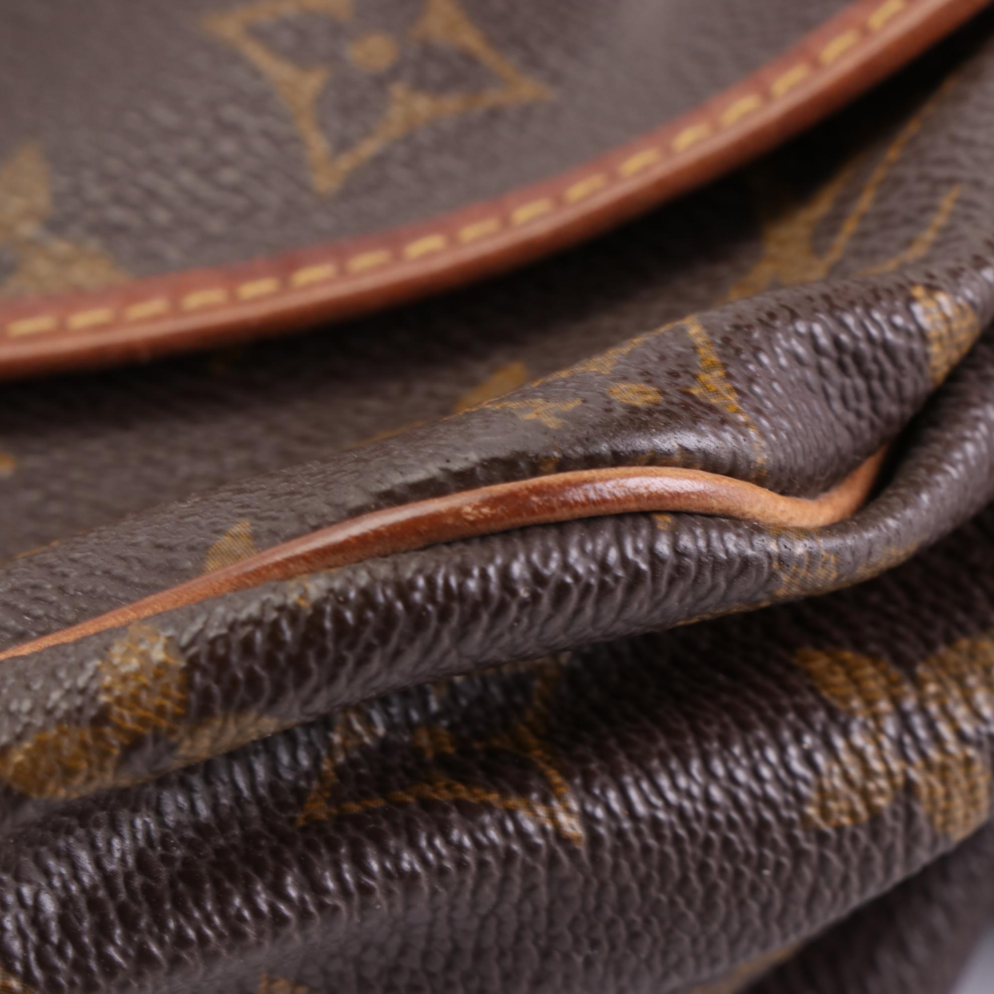 Louis Vuitton Saumur 30 Crossbody Bag in Monogram Canvas and Vachetta Leather