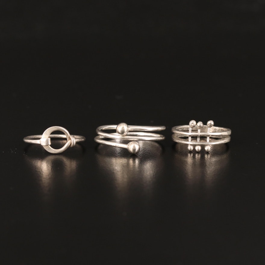 Trio of Geometric Rings