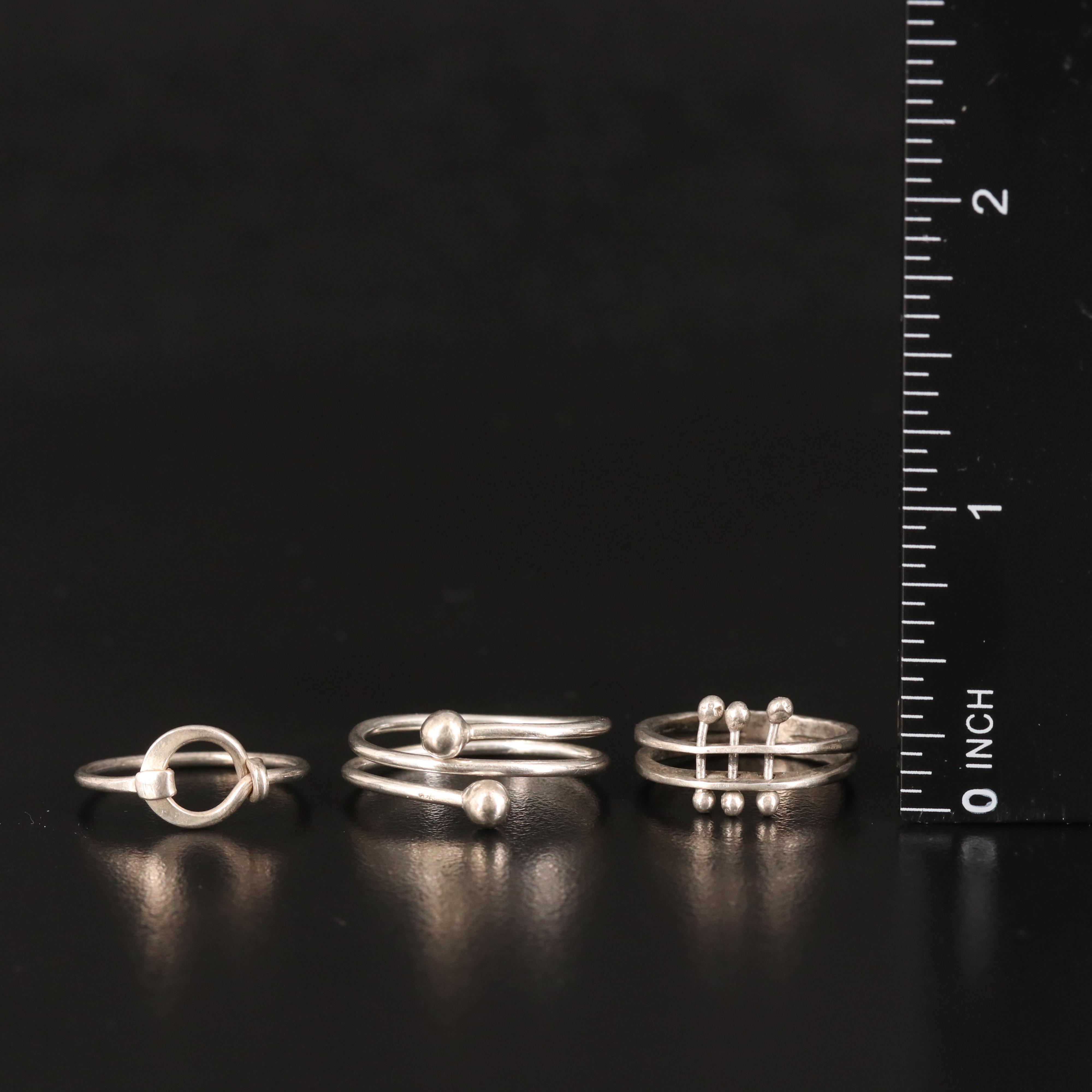 Trio of Geometric Rings