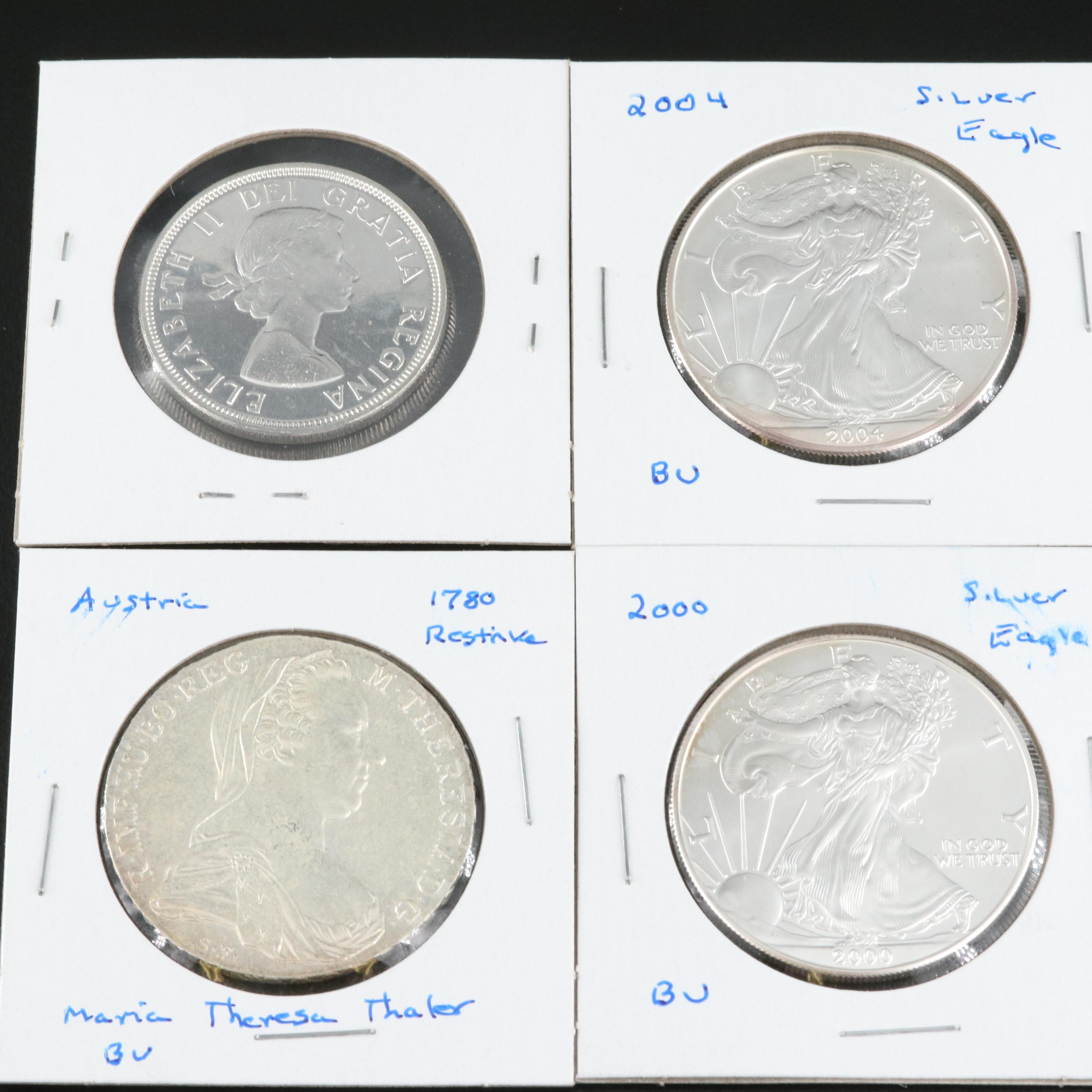 Four Silver Coins Including Eagles