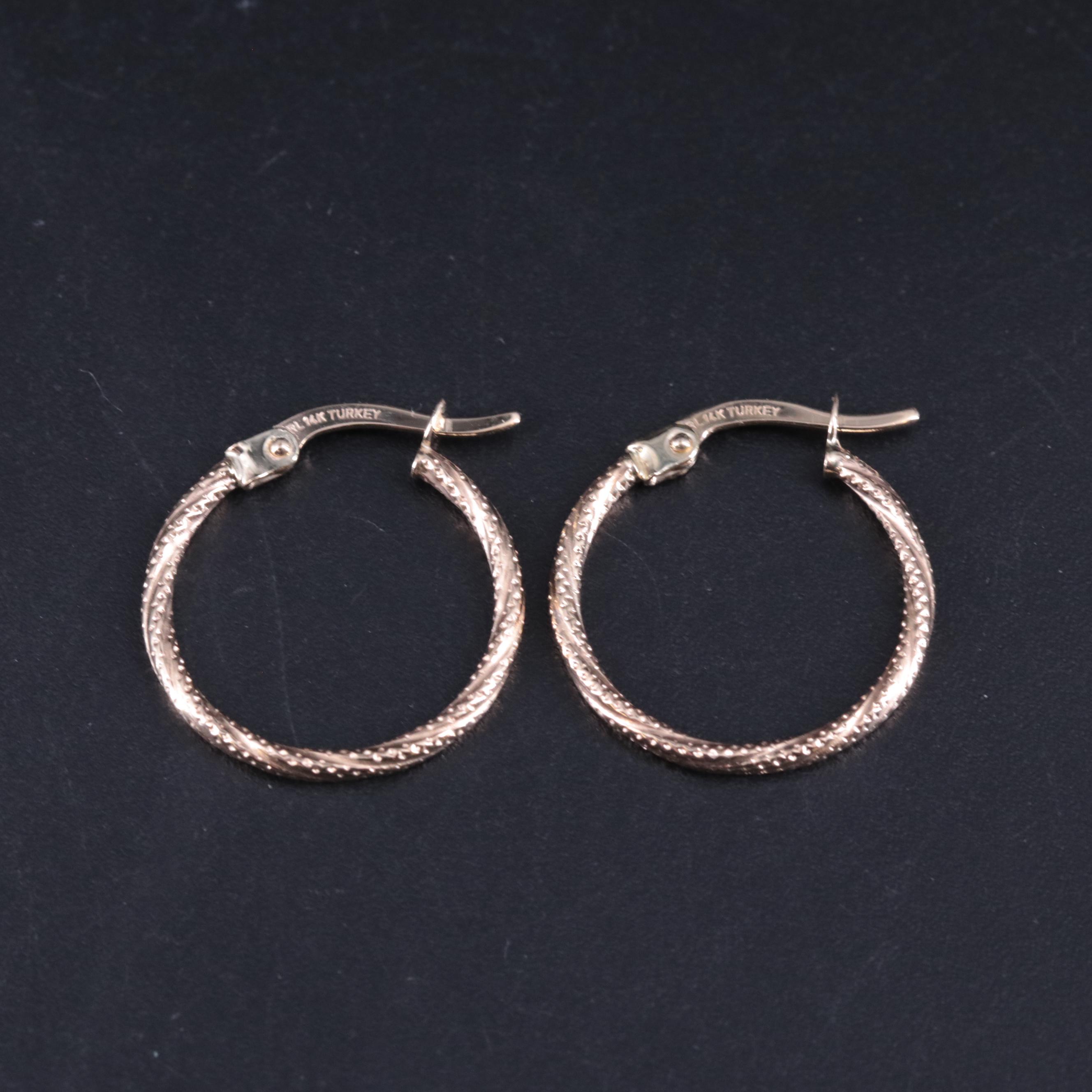 14K Hoop Earrings With Twist Motif