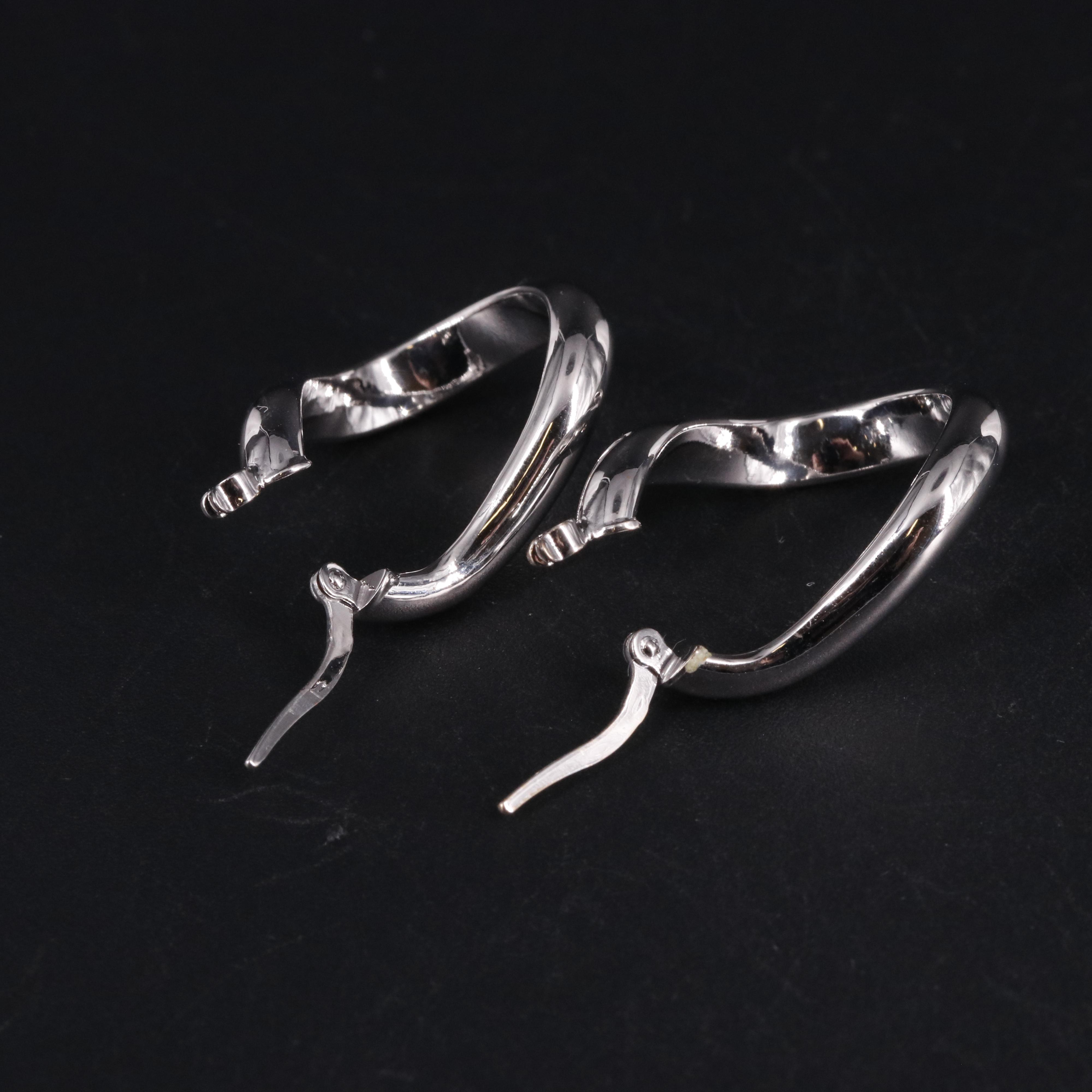 14K Twisted Oval Hoop Latch Back Earrings