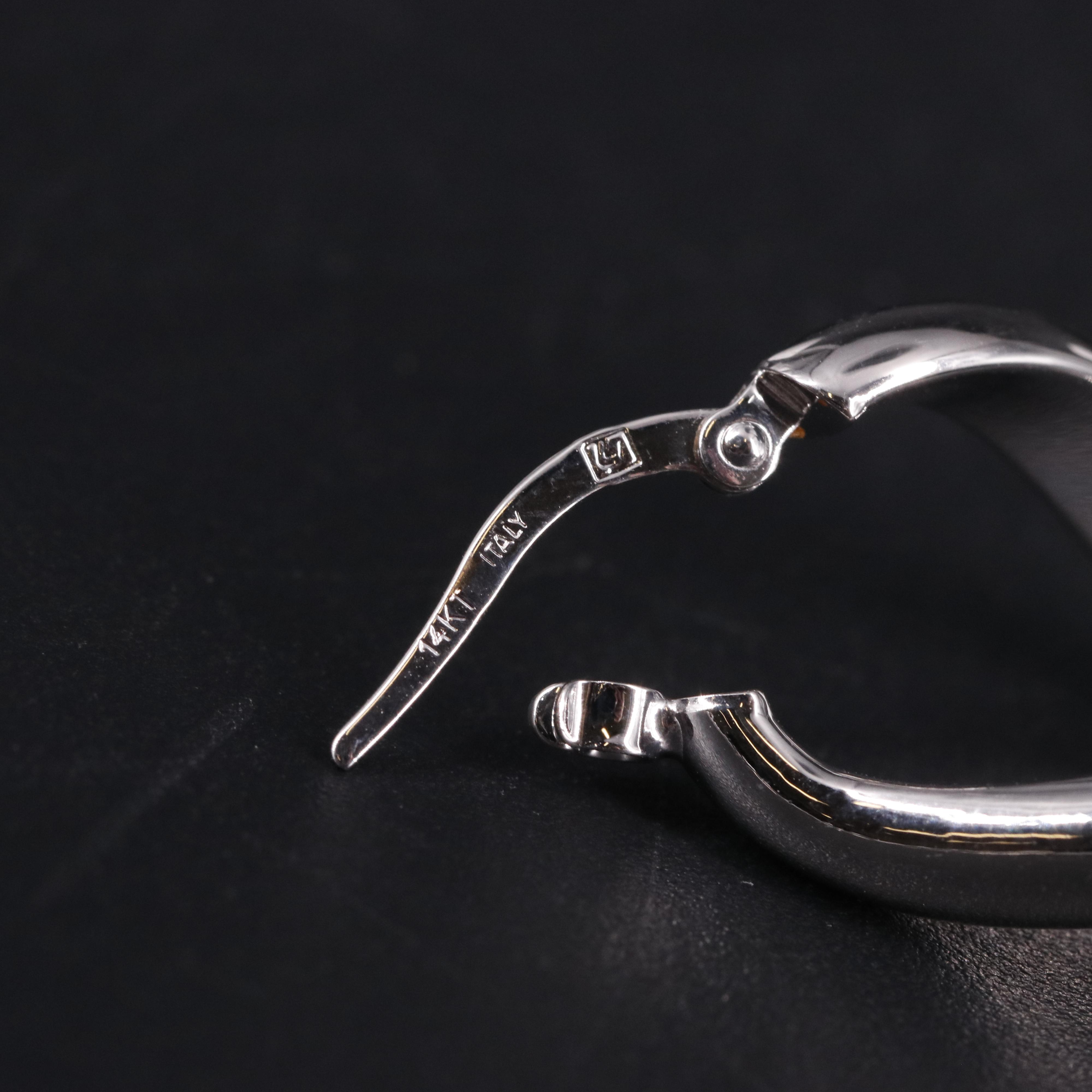 14K Twisted Oval Hoop Latch Back Earrings