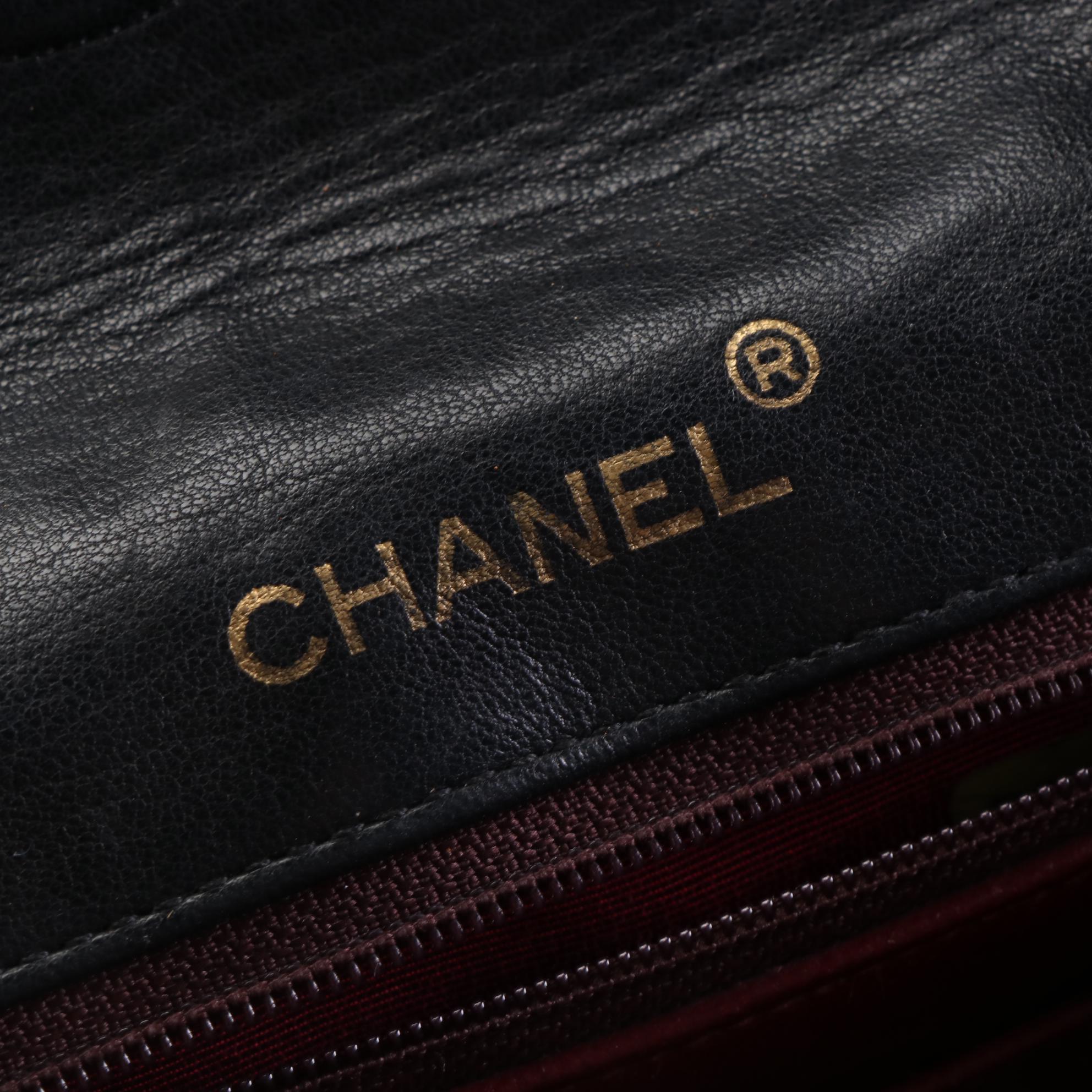 Chanel Mini Classic Flap Bag in Black Quilted Lambskin Leather